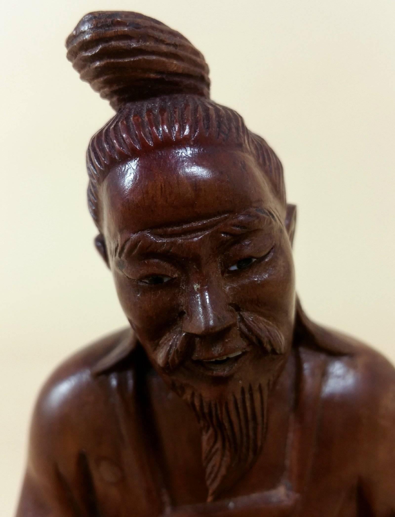 Japanese Fruitwood Carving of a Gentleman Smoking a Pipe 4