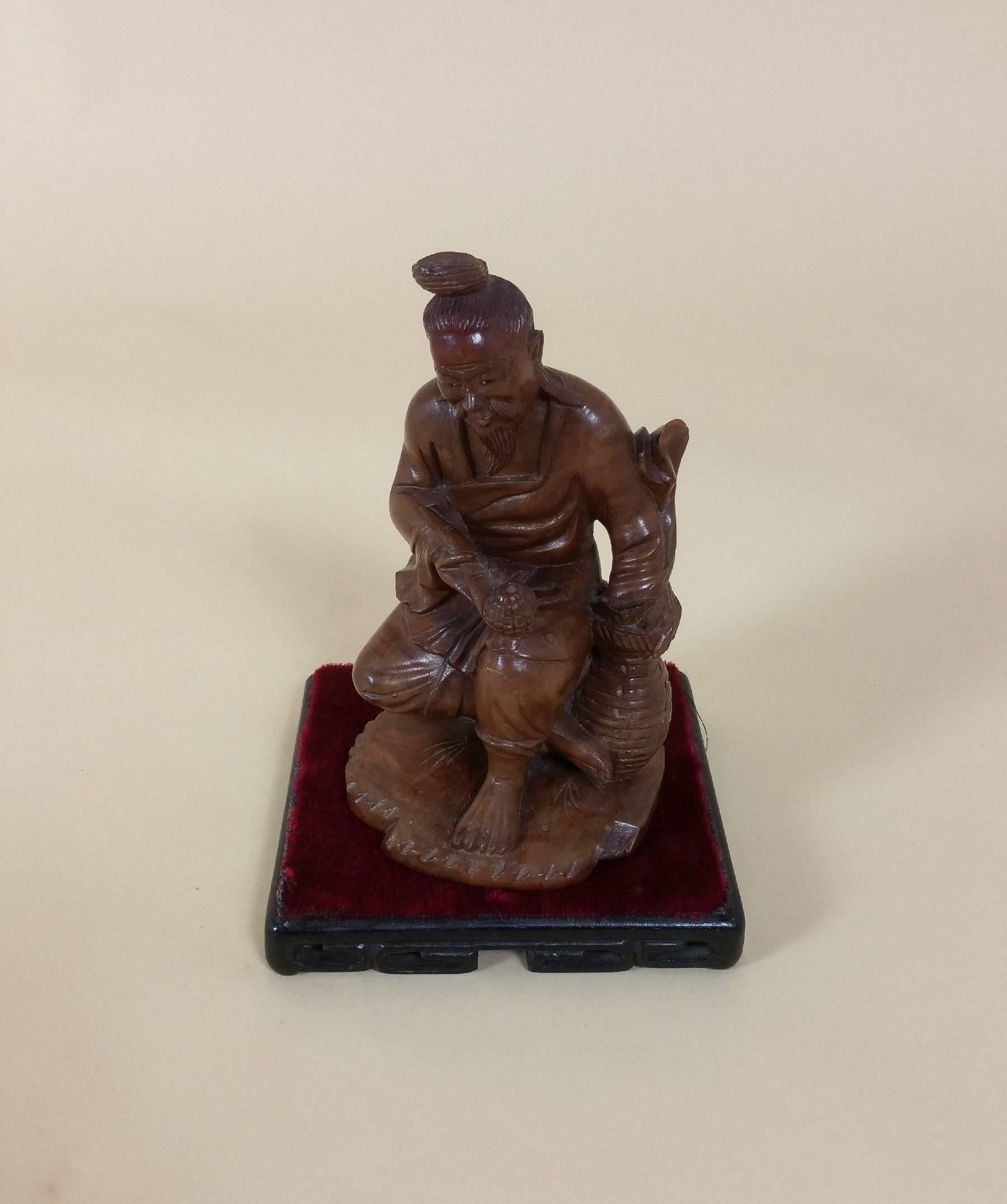 Japanese Fruitwood Carving of a Gentleman Smoking a Pipe 6