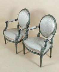 Pair of Late 19th Century French Carved Wood Elbow Chairs