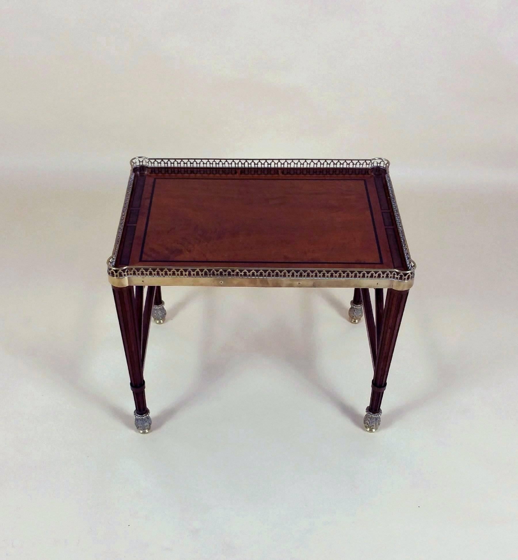 This attractive French satinwood low table was designed by Paul Sormani and is circa 1900. It is inlaid with purple heart and features very decorative ormolu mounts, monogrammed P.S. The table measures 21 ½ in – 54.6 cm wide by 15 ½ in – 39.4 cm