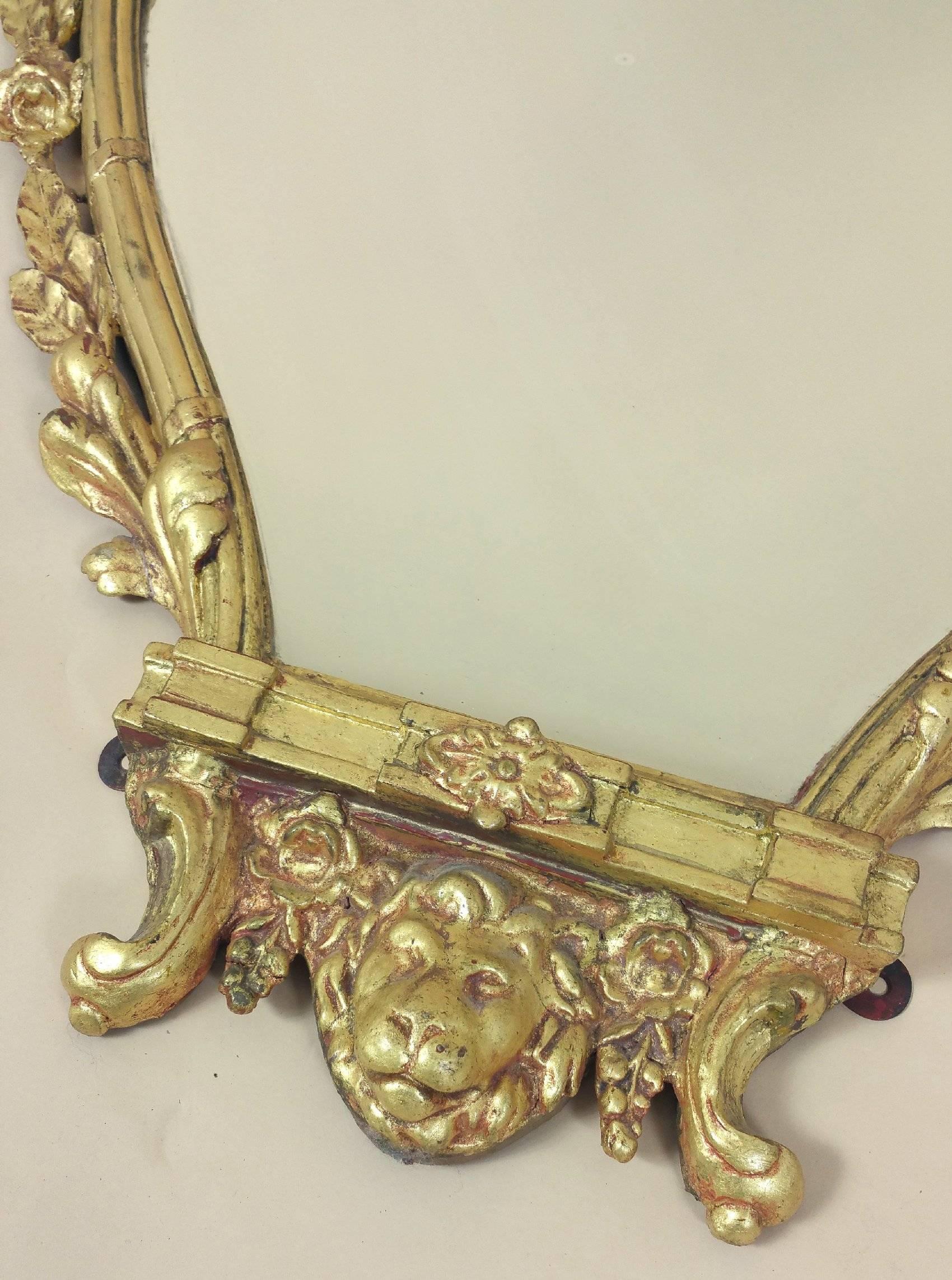 English Pair of Mid-19th Century Neoclassical Gilt Shaped Wall Mirrors