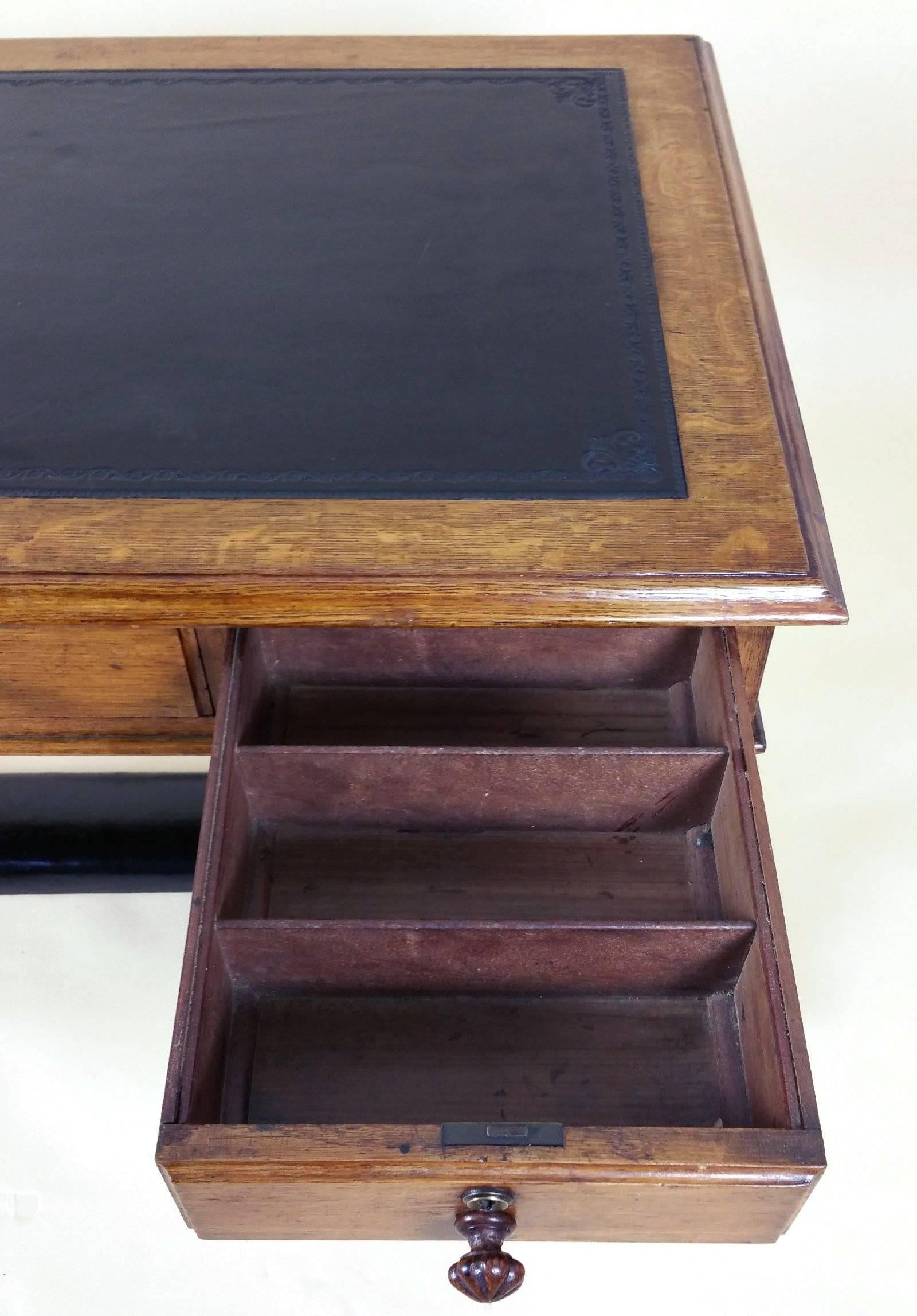 English Mid 19th Century Oak Three-Drawer Writing Table