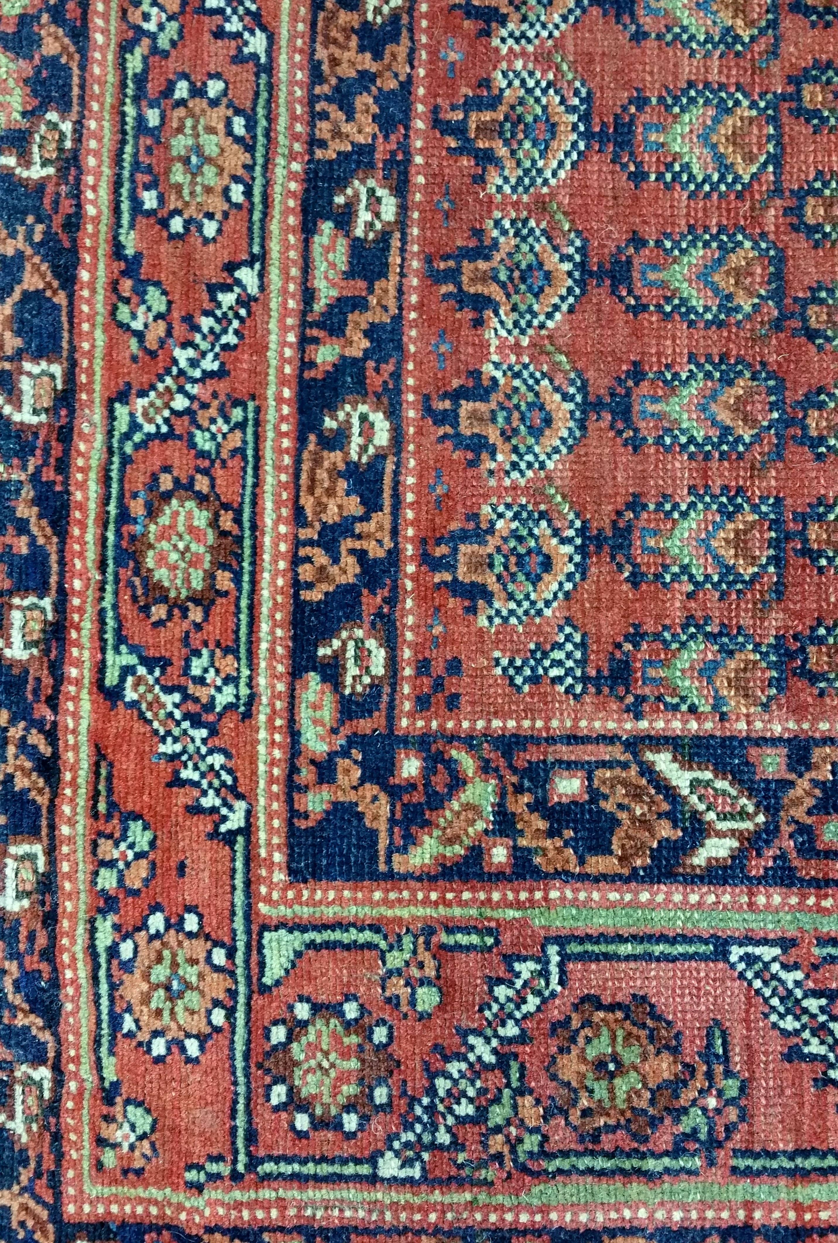 Hand-Knotted Early 20th Century Persian Red Ground Rug