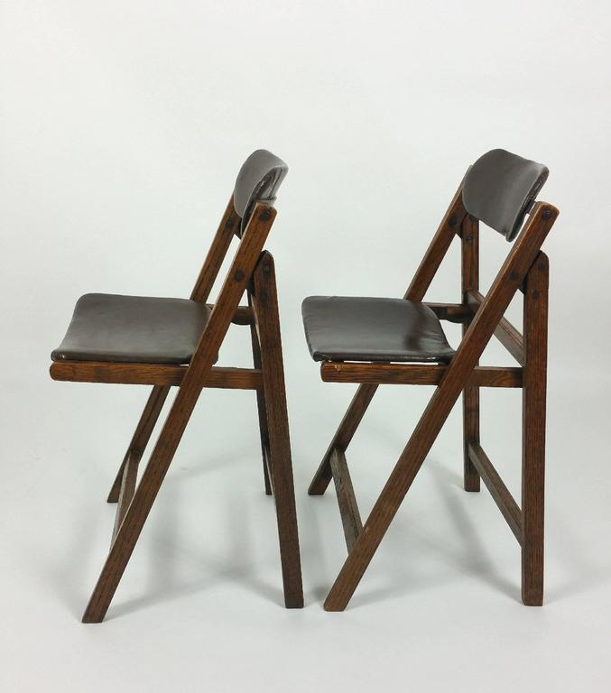 Pair of Edwardian Oak and Leather ‘Tansad’ Folding Chairs at 1stDibs