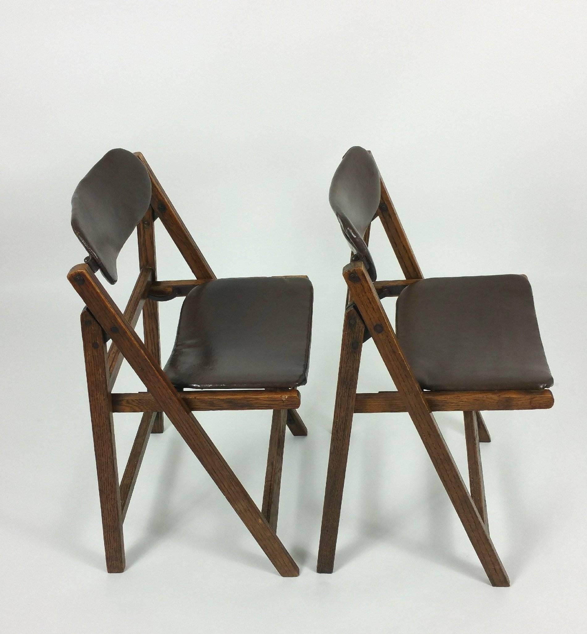 Pair of Edwardian Oak and Leather ‘Tansad’ Folding Chairs 1