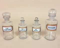 Set of 14 Early 20th Century Pharmacy Glass Jars with Rebated Gilt Labels