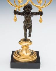 Fine Pair of Regency Ormolu and Bronze Cherub Candelabra