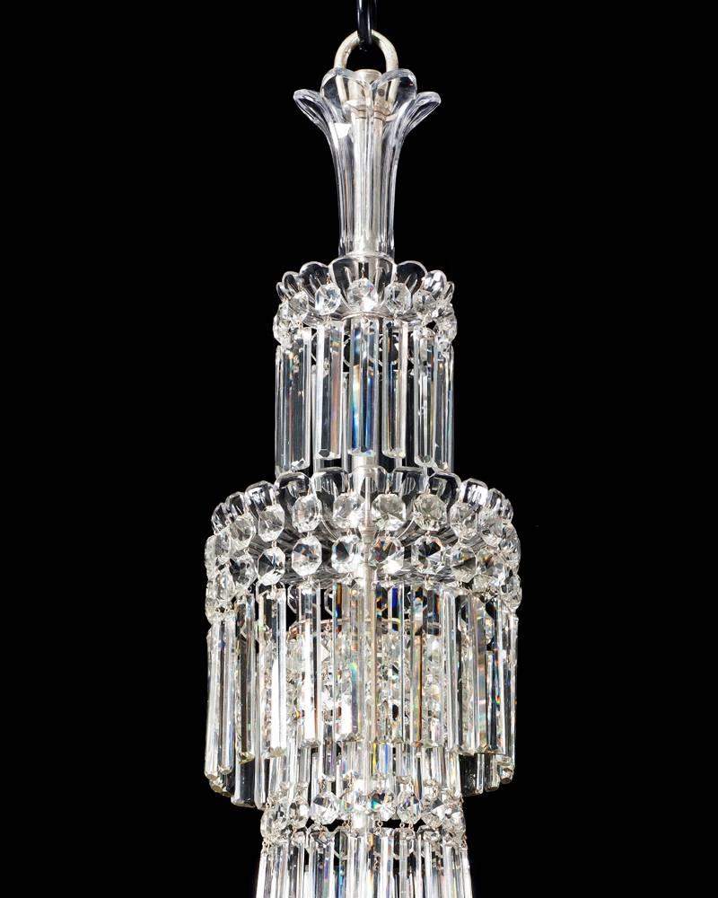 A fine quality Victorian ten light cut-glass and silvered mounted chandelier of Classic tent and waterfall design the main stem consisting of a rule drop tent and two drop hung canopy's terminating with trumpet shaped top piece. The main frame