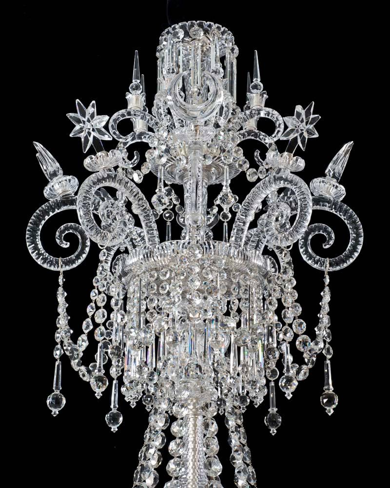 An extremely rare early Victorian 20-light cut-glass silvered mounted chandelier of exceptional quality the baluster thumb and radial cut shaft with lower shaft canopy and draping pan this pan suspending chains of spangles the top of the chandelier