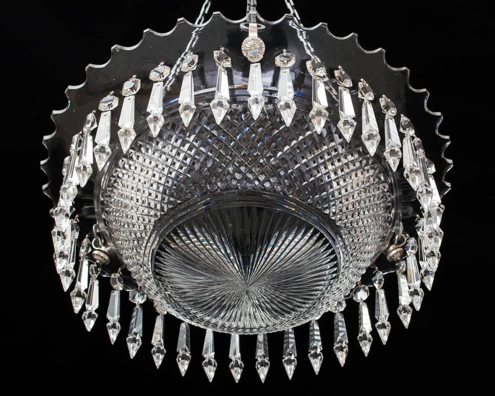 A fine Victorian bowl light with scalloped rim having a diamond cut band and star cut centre the bowl hung with spear dpors.