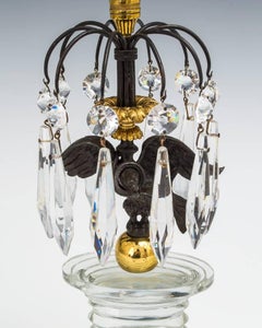 Paire de chandeliers à aigle de style Régence