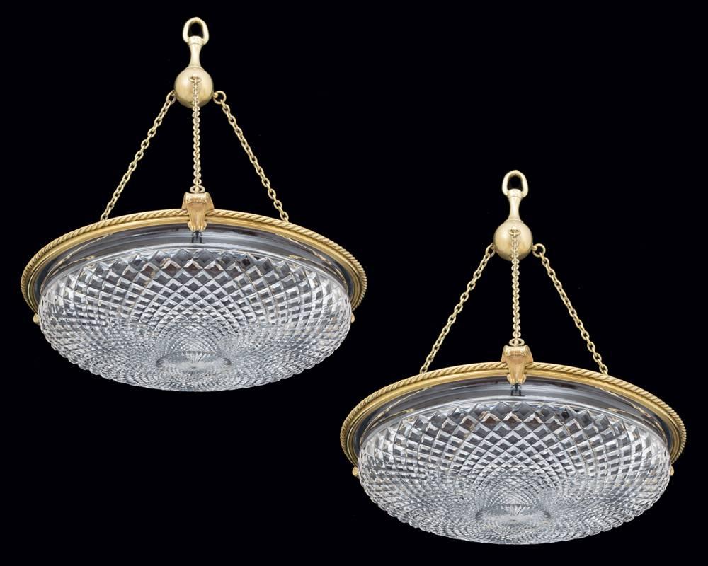 A pair of gilt brass dish light by F. & C. Osler with flat diamond cut dishes.
  