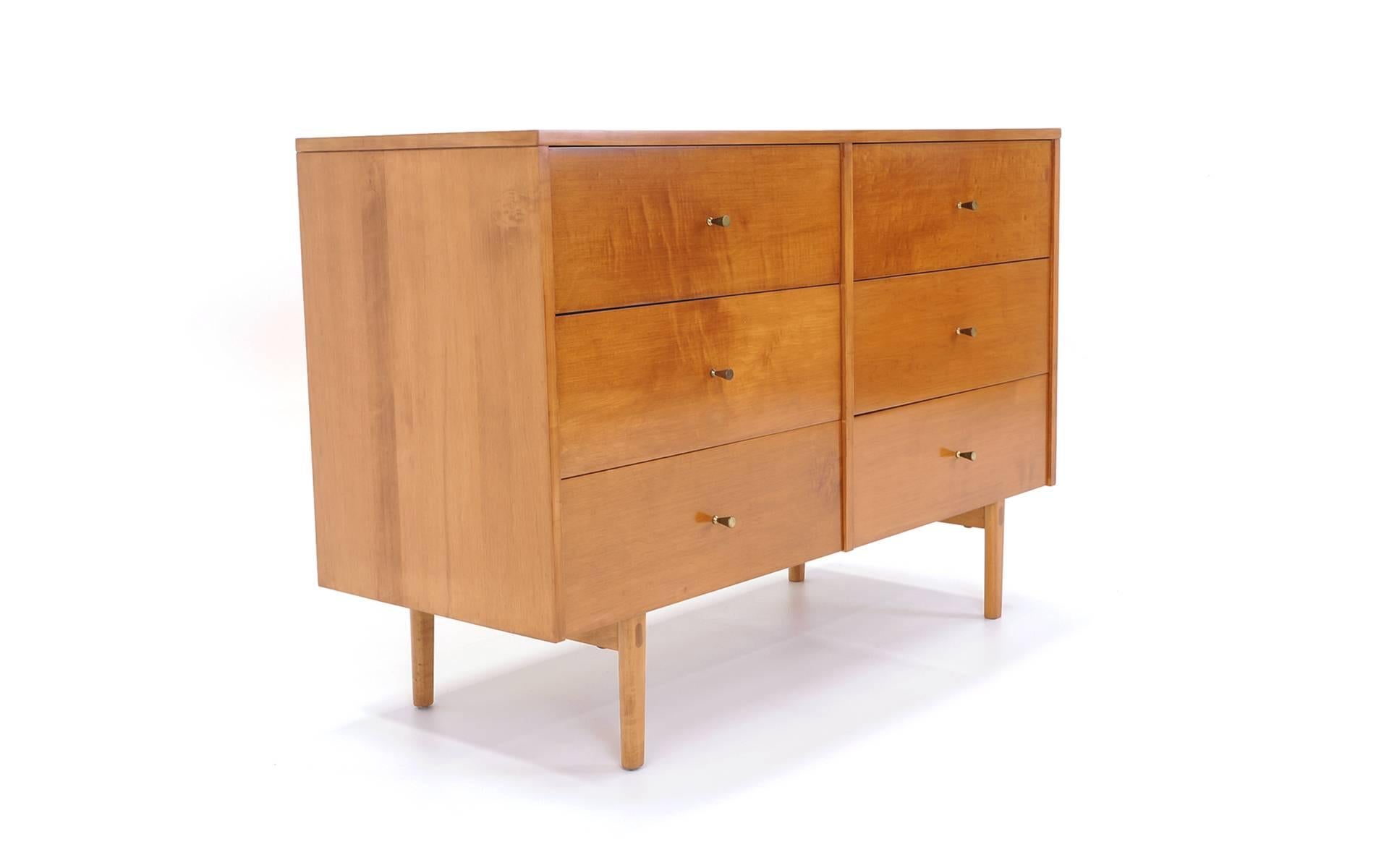 Virtually flawless Paul McCobb six-drawer dresser. Original conical brass pulls.