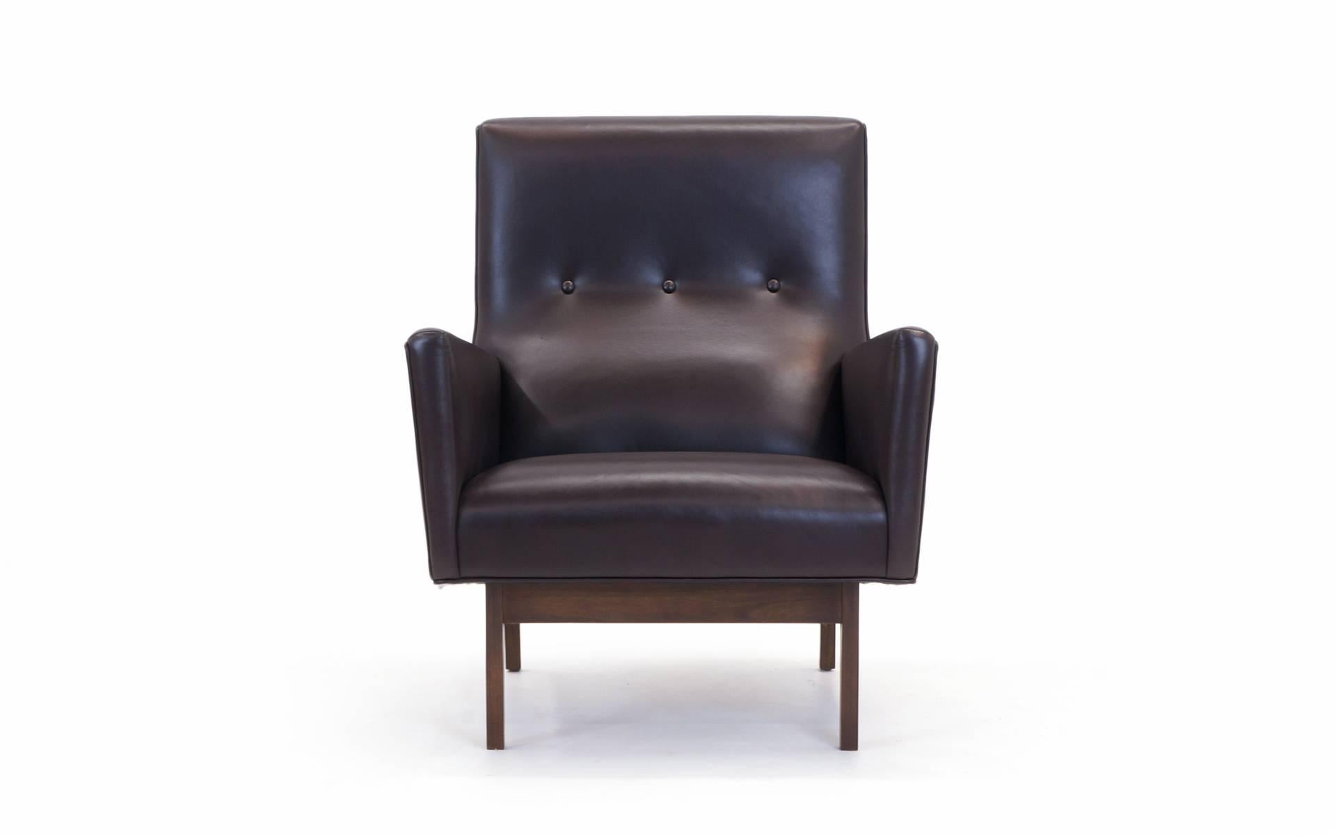 Based on a design by Jens Risom, this is a custom built and never used lounge chair. Extremely high quality materials and construction: Walnut, hard woods, and Edelman chocolate brown leather. Very comfortable with added lumbar support.
