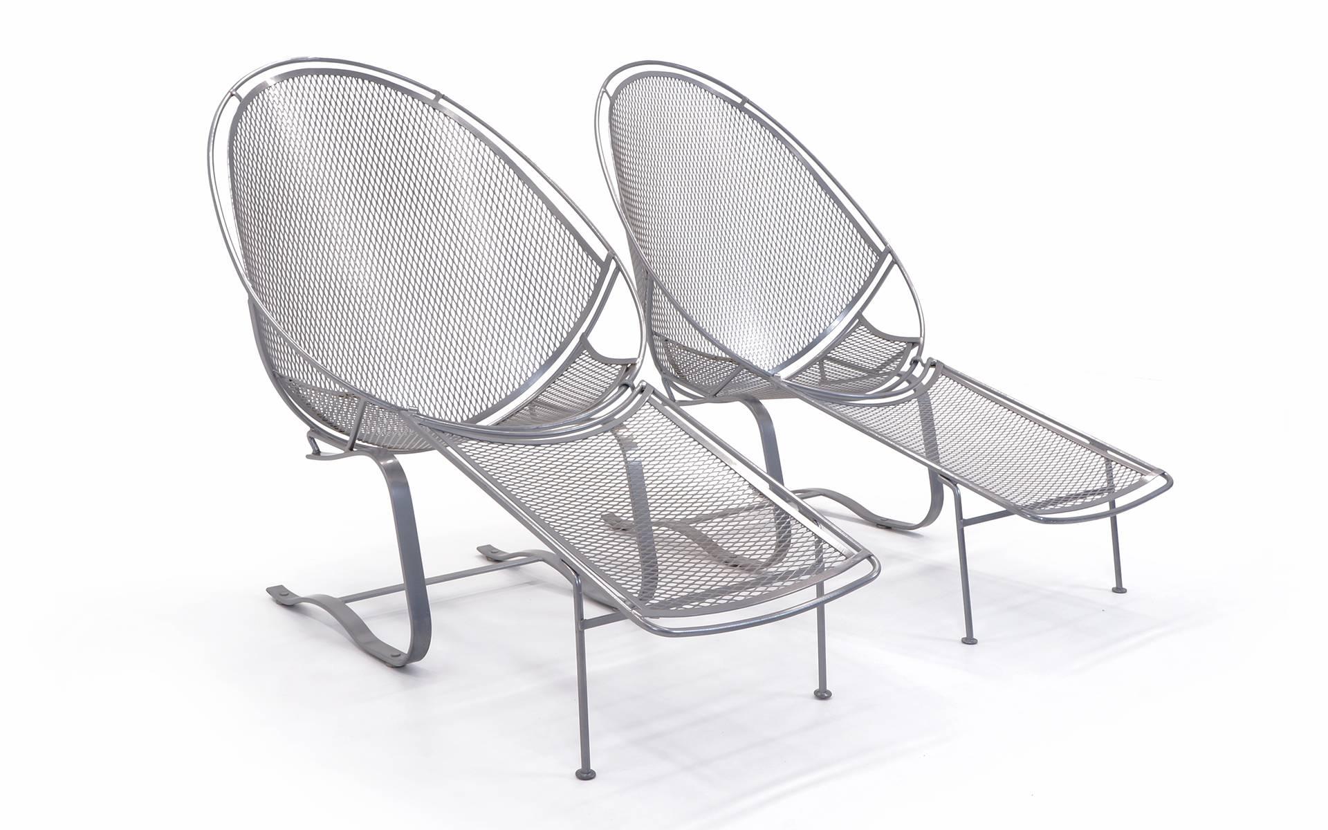 Outdoor / pool high back lounge chairs on Springer base, with removable footrests / ottomans, designed for John Salterini Company, Brooklyn NY, 1965. These were professionally powder coated two seasons ago in a satin silver color. They still look