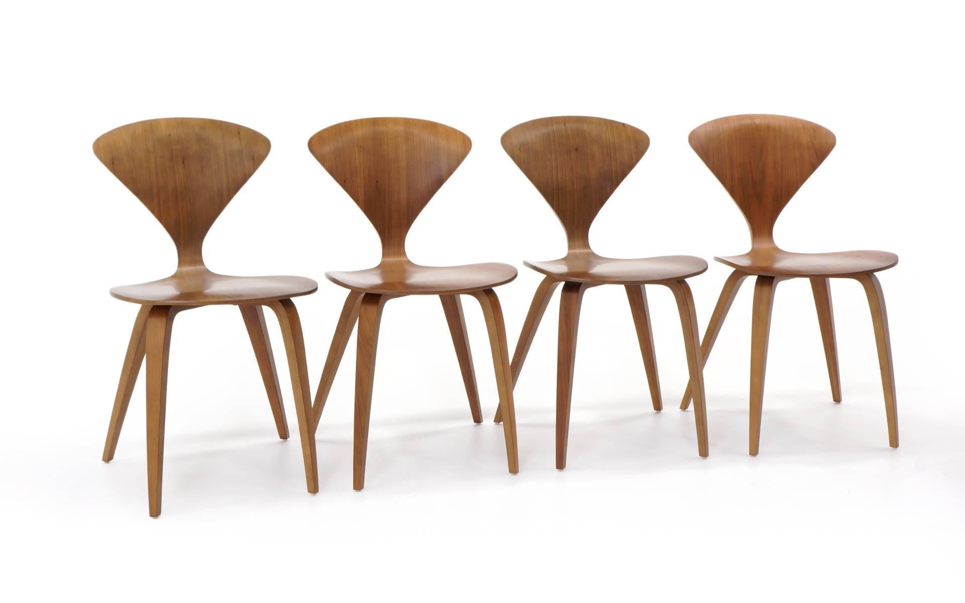 Set of six Cherner chair is walnut. Licensed production and only a few years old. Side chair dimensions are down the page.
Armchair dimensions:
Width 26.
Depth 18.75.
Height 31.25.
Seat height 17.25.