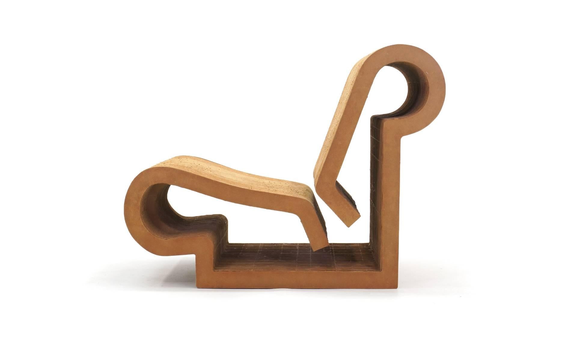 Iconic, original contour chair designed by Frank Gehry for easy edges. Made of Industrial corrugated cardboard and masonite.