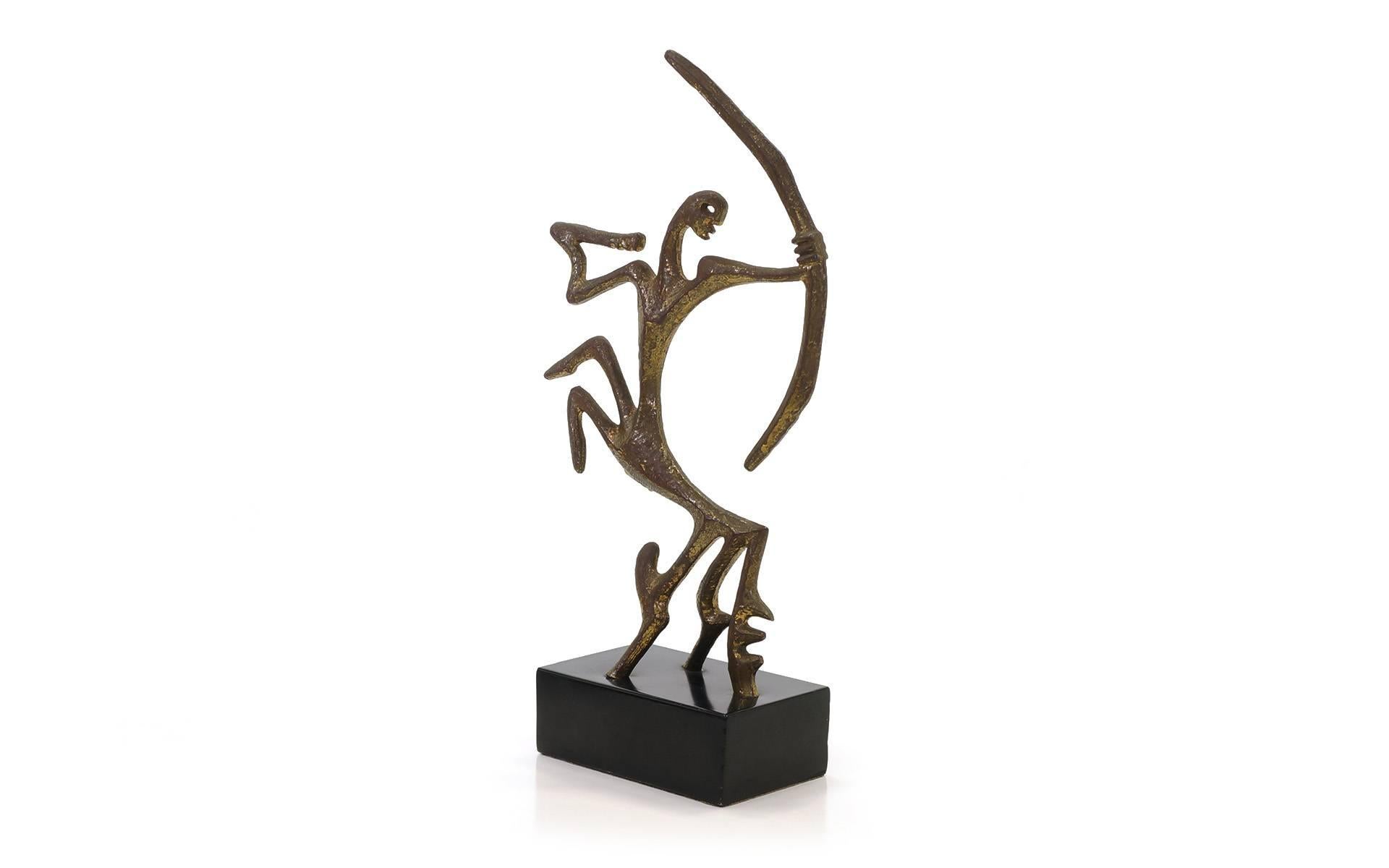 Bronze 1950s Frederic Weinberg table sculpture. Abstract Sagittarius form. Beautifully patinated bronze.