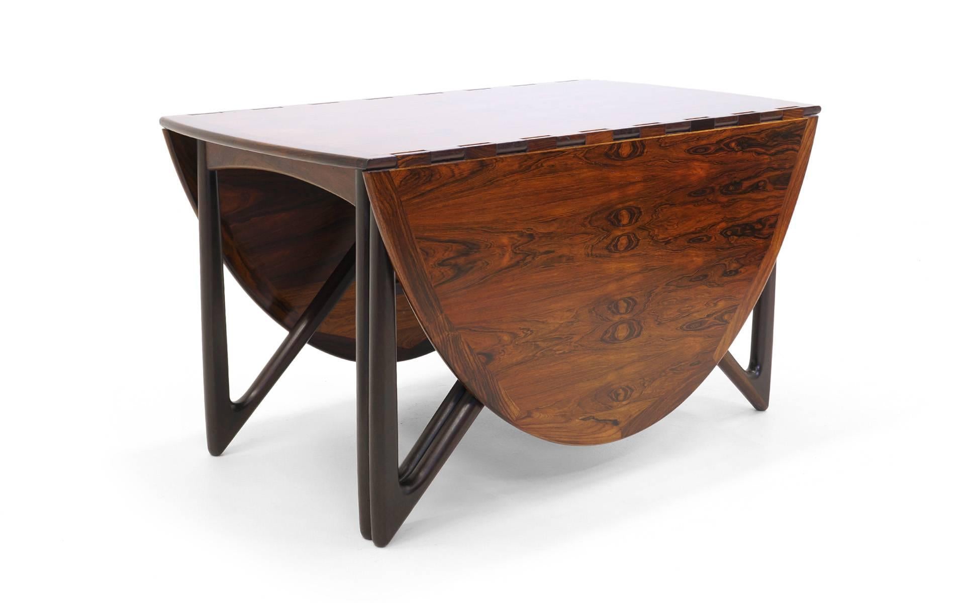Scandinavian Modern Kurt Ostervig Oval / Eliptical Rosewood Gateleg / Drop-leaf Dining Table.
