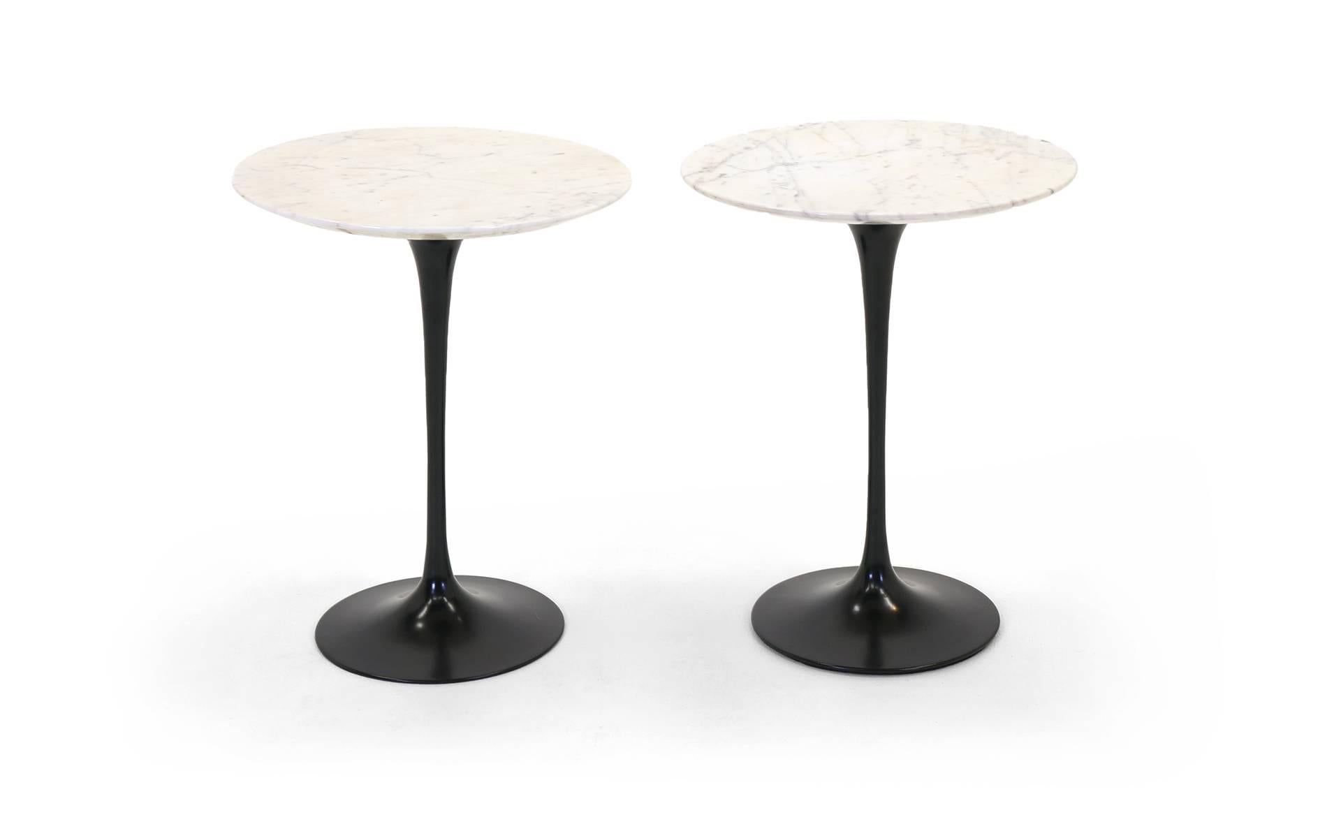 Pair of Eero Saarinen for Knoll side tables. Black lacquered bases with white marble tops. Excellent condition.