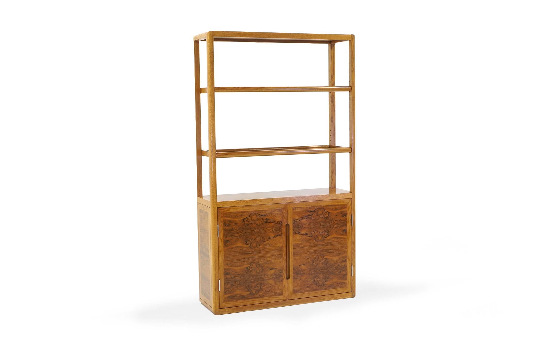 Edward Wormley storage cabinet with adjustable shelves. Beautiful Brazilian rosewood case and shelves with a bleached mahogany frame. 78 inches high. 45 inches wide, 15 inches deep. Base section of cabinet is 32 inches in height. Interior shelves