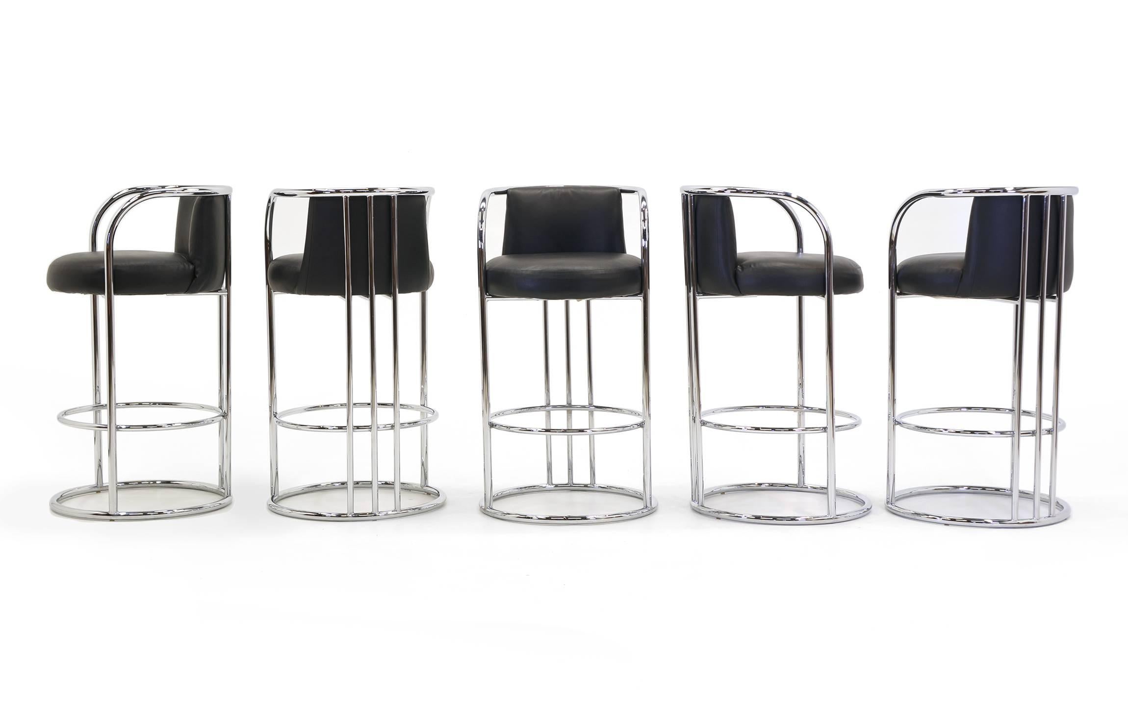 Rare original Milo Baughman design bar stools with chrome frames and black vinyl seats. Retain the Thayer Coggin labels stating Milo Baughman design. Very comfortable with both backrests and arms. Five total. Buy any number.