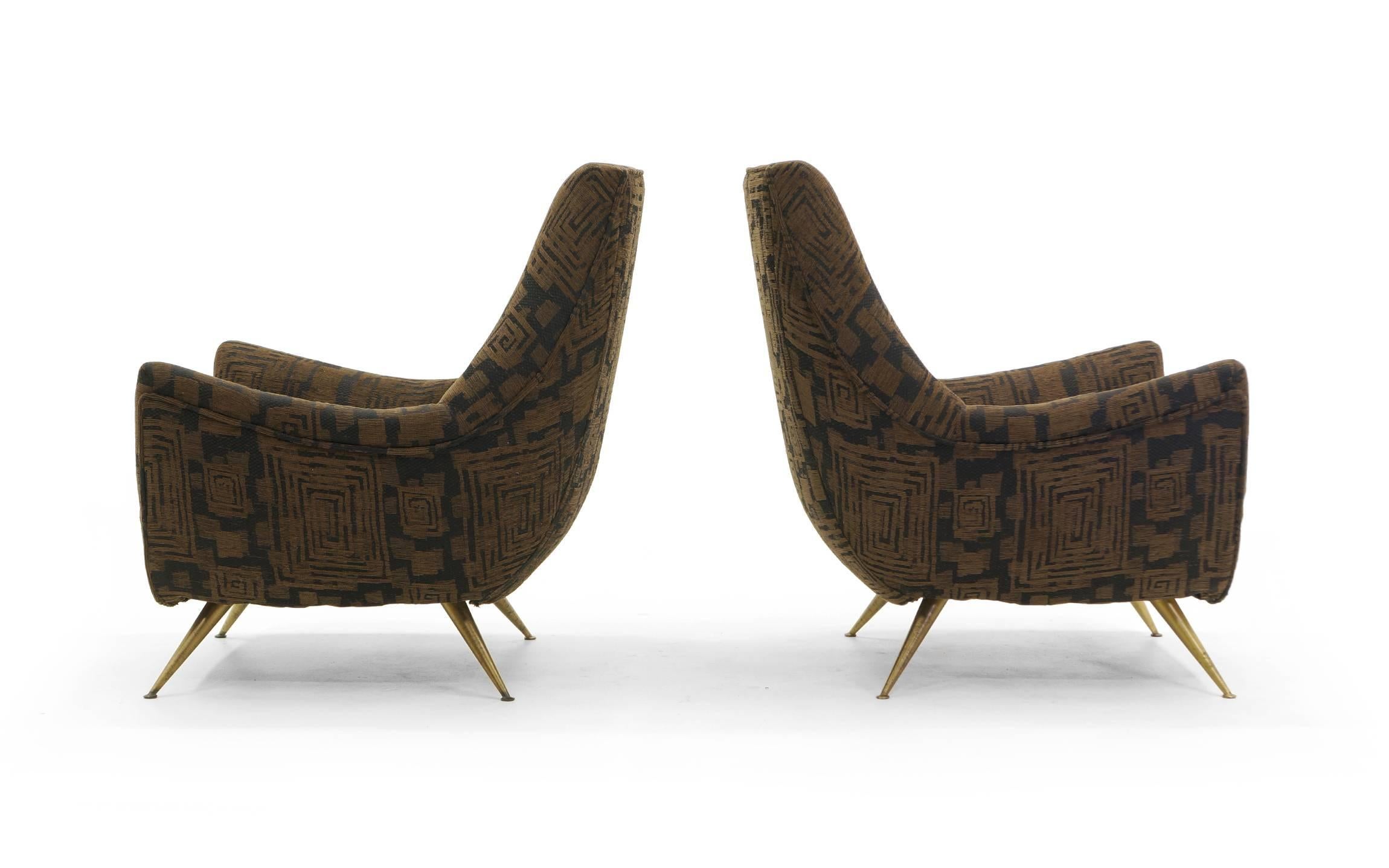 Excellent pair of lounge chairs designed by Henry P. Glass.  Upholstery and brass splayed legs.  Recently restore and reupholstered.