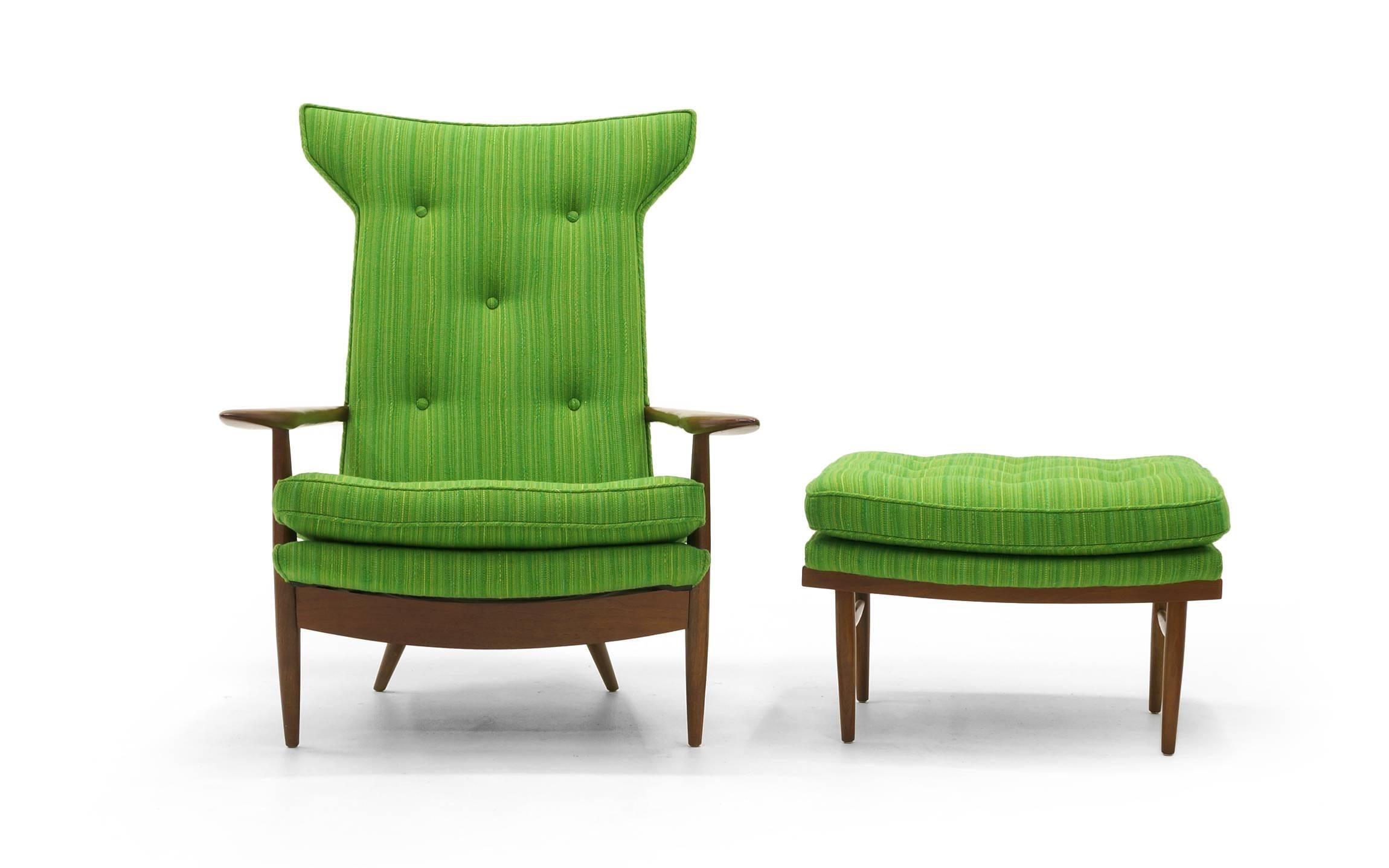 Rare high back lounge chair with ottoman designed by George Nakashima for Widdicomb. New upholstery in a striking green wool blend fabric and cherrywood frame. Measures: Ottoman is 26 in. deep and 24 in. wide.