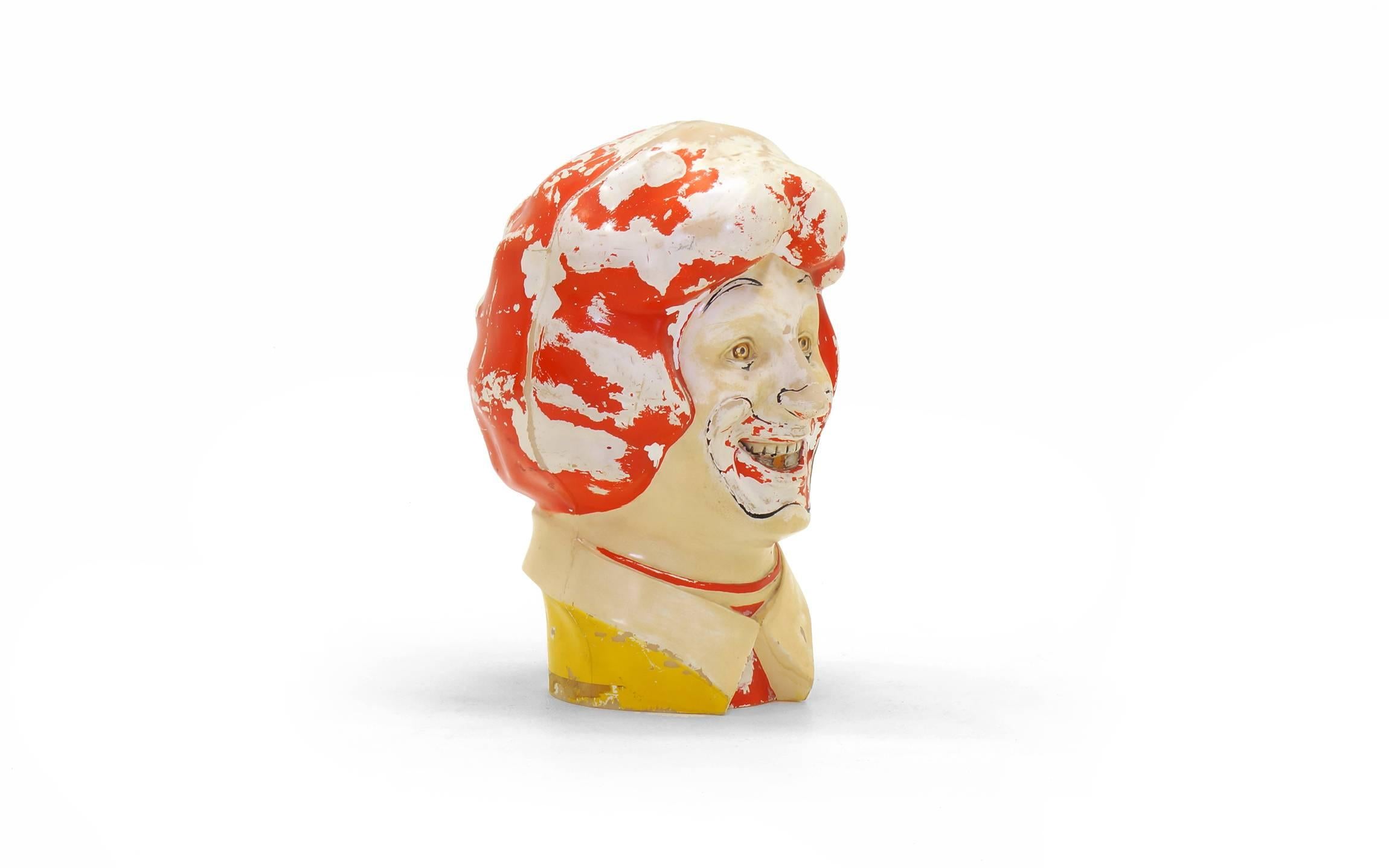 It's strange and freaky, but so cool. Vintage Ronald McDonald plastic clown head sculpture. By the way, it is hollow inside and can be put over ones head and you can see through the hole in the mouth. That hole was originally for a helium dispenser.