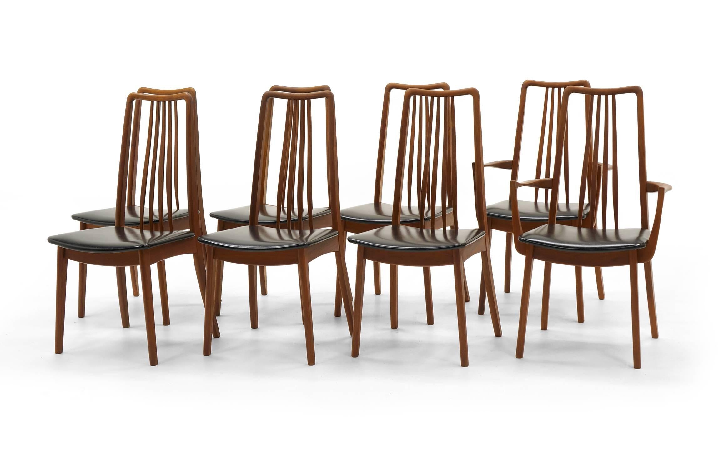 Rare set of eight Danish modern dining chairs by Anders Jensen, Denmark, 1960s. Two armchairs and six side chairs. Original black vinyl seats in excellent condition. Measure: Armrest width is 22.5 inches.