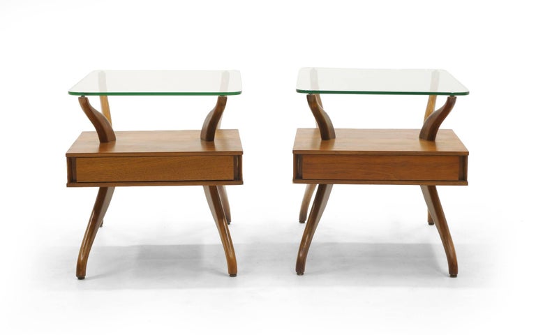 Super sculptural three-piece living room table set. One of the coolest things we've ever seen. And we have never seen it before. The coffee table and two side tables are sculpted walnut with glass tops in the style Adrian Pearsall. The End tables