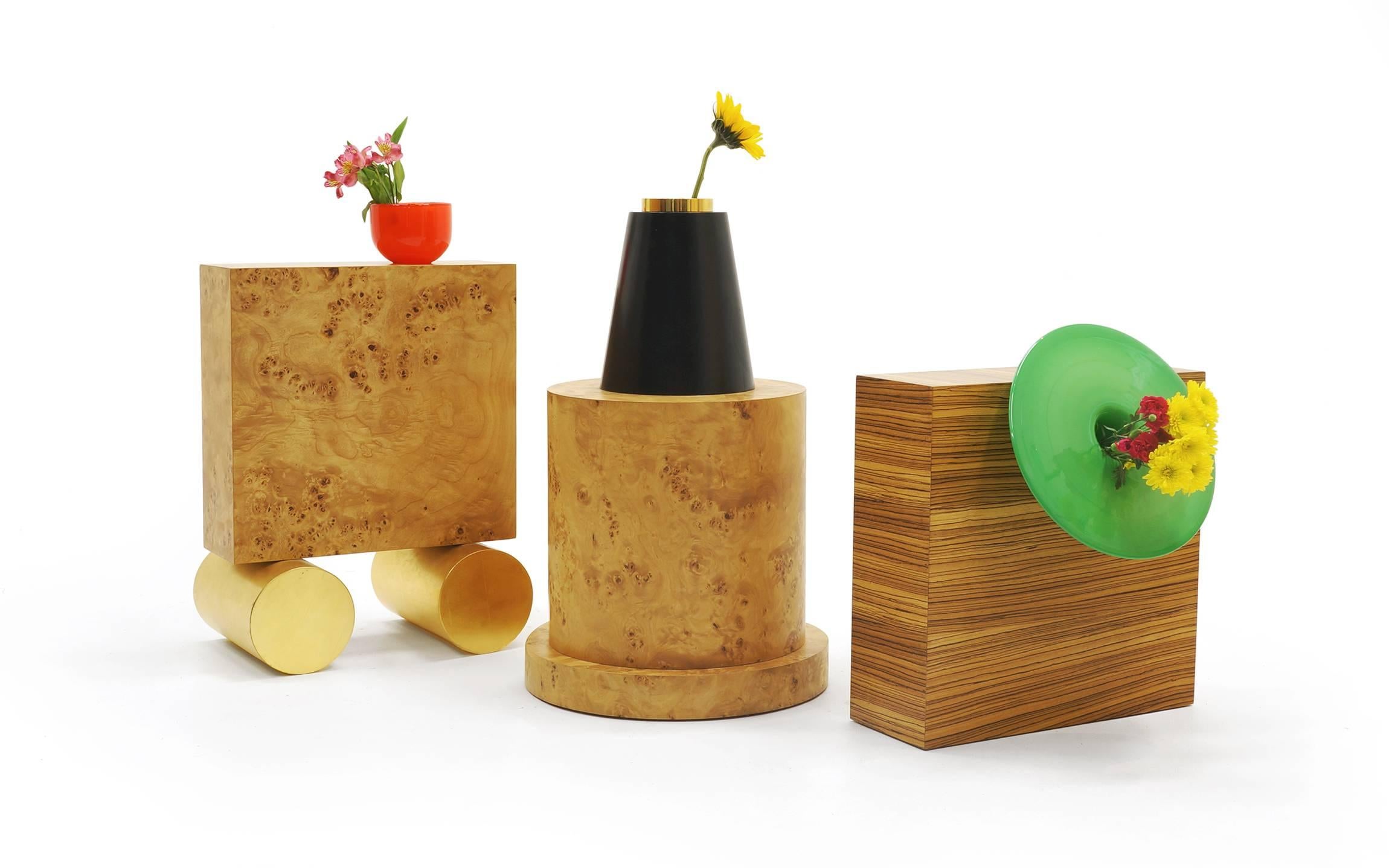 Two large vases by Ettore Sottsass from 27 woods for a Chinese Artificial flower. Edition S (red) is SOLD.  Each from the edition of 12. From left to right in our main photo, these are editions 