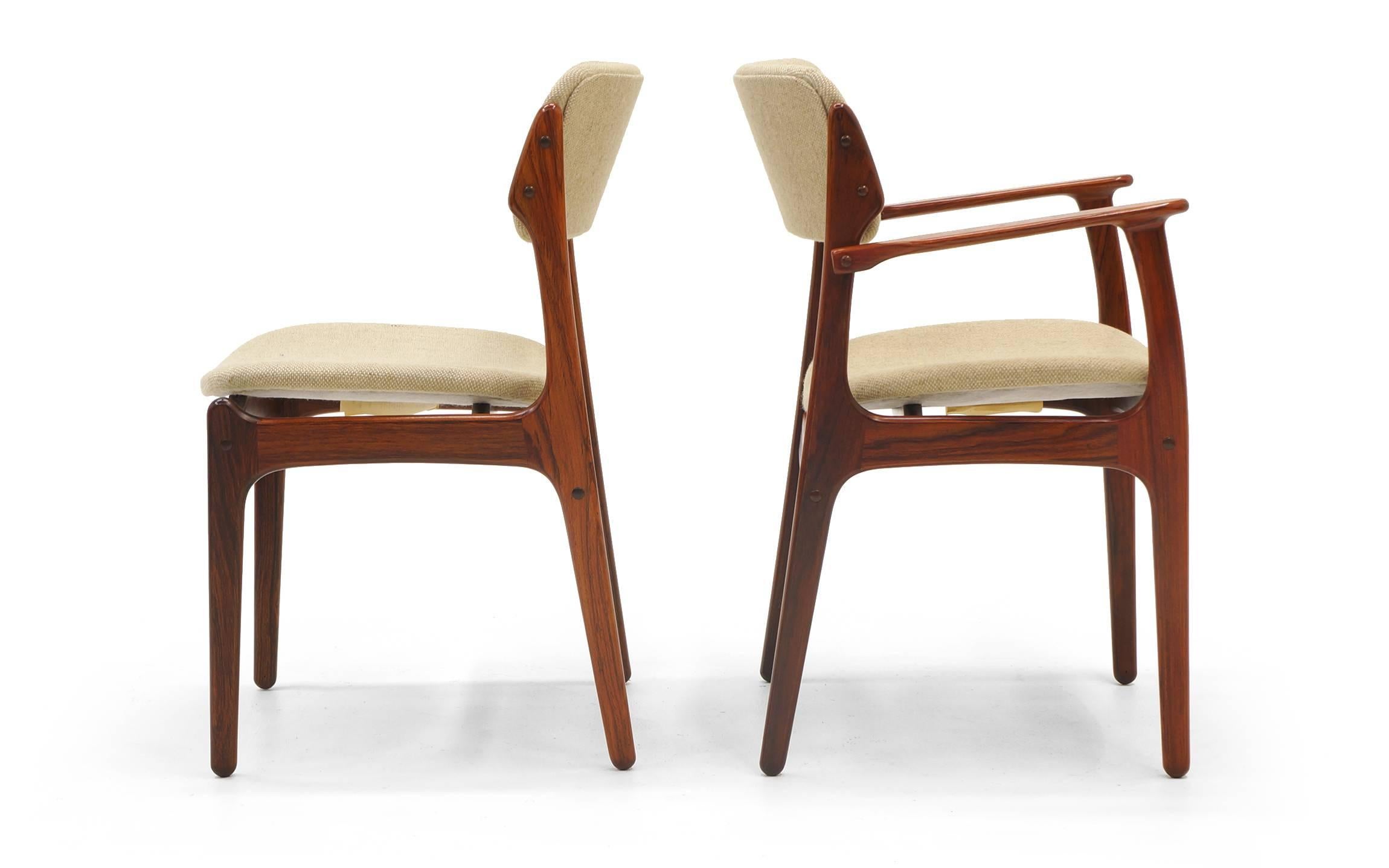 Set of eight rosewood dining chairs by Erik Buch. Two arm chairs and six side chairs. Rosewood frames are in excellent condition. Fabric is in fair condition and is likely a candidate for updating.
Measure: Armchair width is 24 inches, chair width