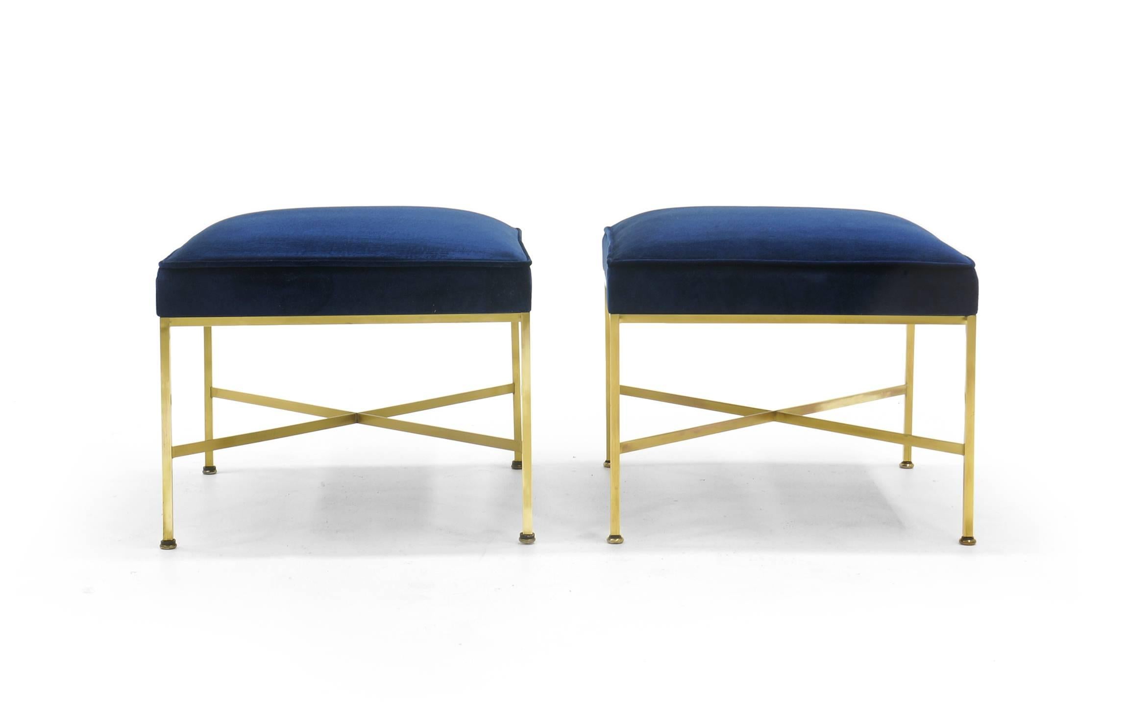 Pair of Paul McCobb for Calvin X-base stools benches with new deep blue wool velvet upholstery. The solid brass square tubing is polished to a beautiful luster. These are excellent examples of this design.