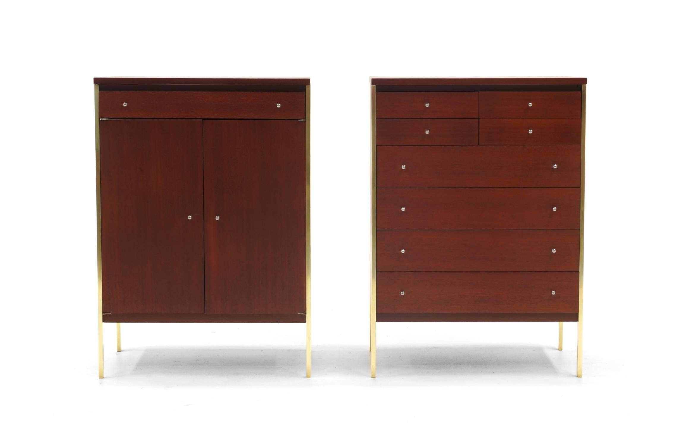 Pair of Paul McCobb storage cabinets or dressers from the Connoisseur Group for H. Sacks and Sons. One cabinet features one drawer and two doors concealing storage and second cabinet features eight drawers. Expertly and beautifully restored and