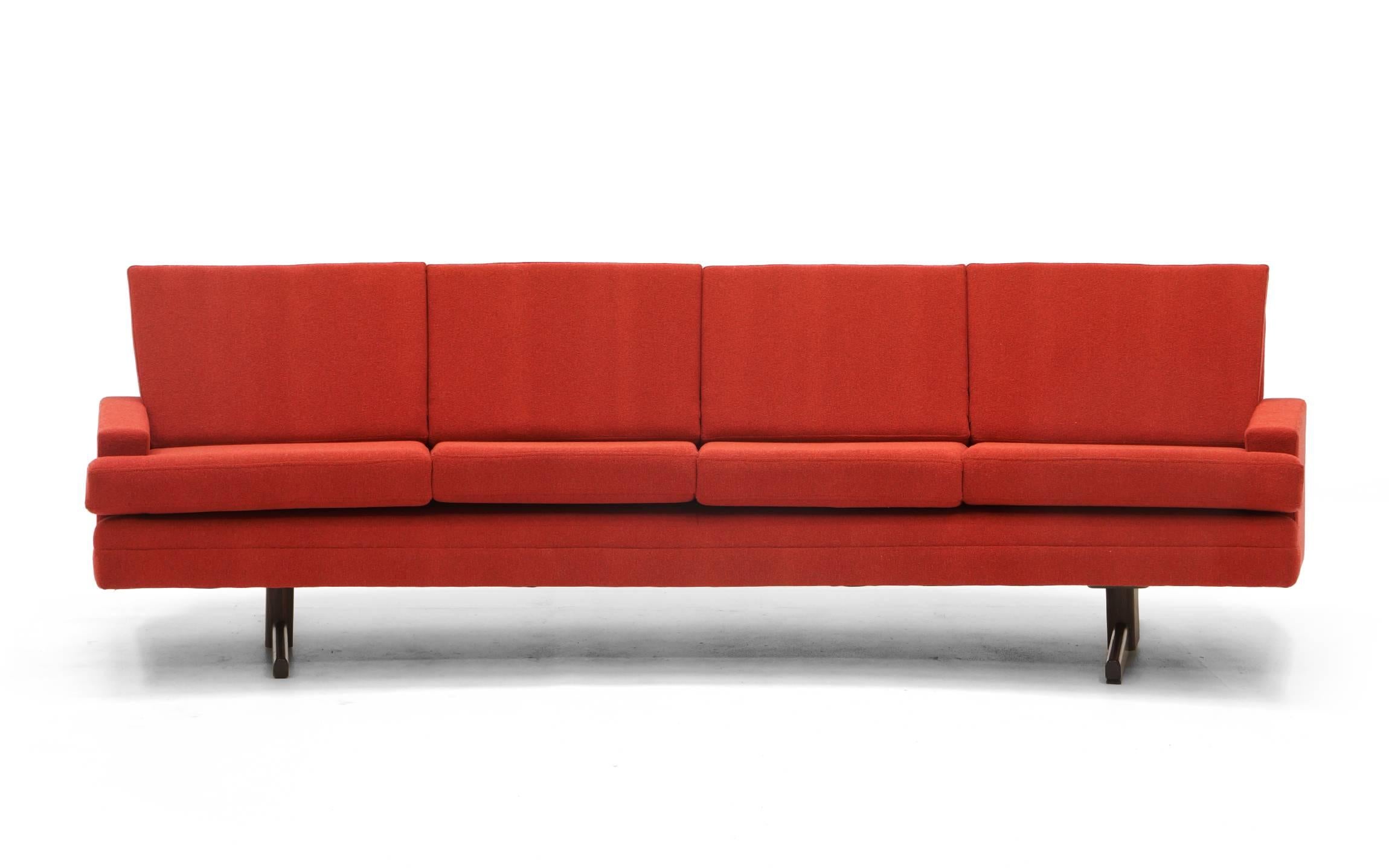 Curved sofa with Rosewood legs designed by Frederick A. Kayser for Vatne Mobler, Norway, 1960s. Completely restored and reupholstered in a deep red Knoll Cuddle Cloth. The fabric is mostly red with charcoal thread as well. Cuddle Cloth is $100 per