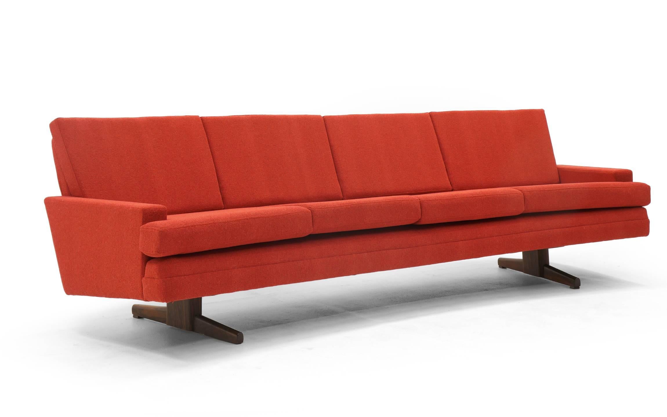 red curved sofa