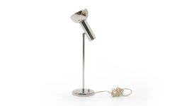 George Kovacs Chrome Table beside Lamp