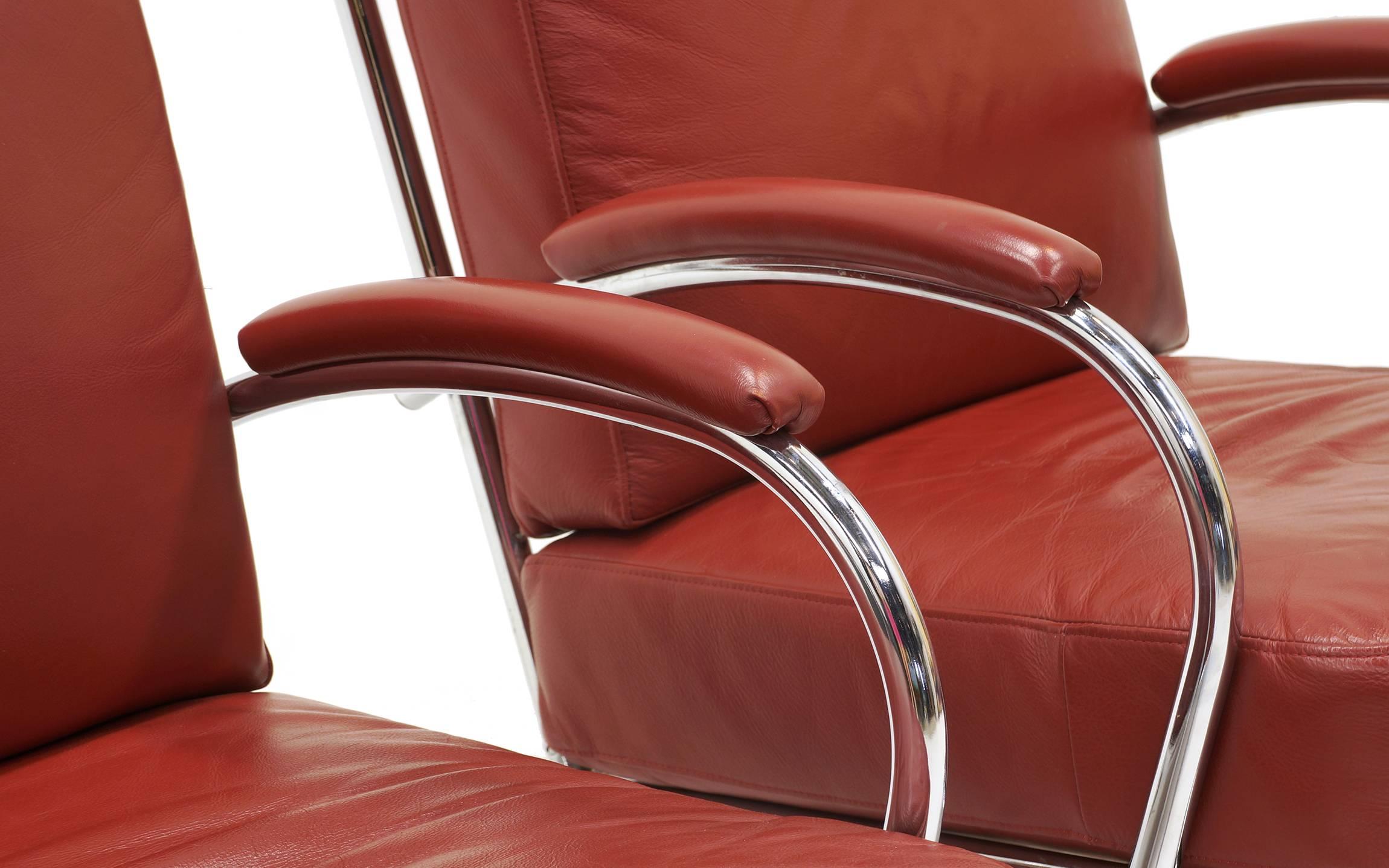American Pair of Tubular Chrome and Red Leather Lounge Chairs by KEM Weber for Lloyd