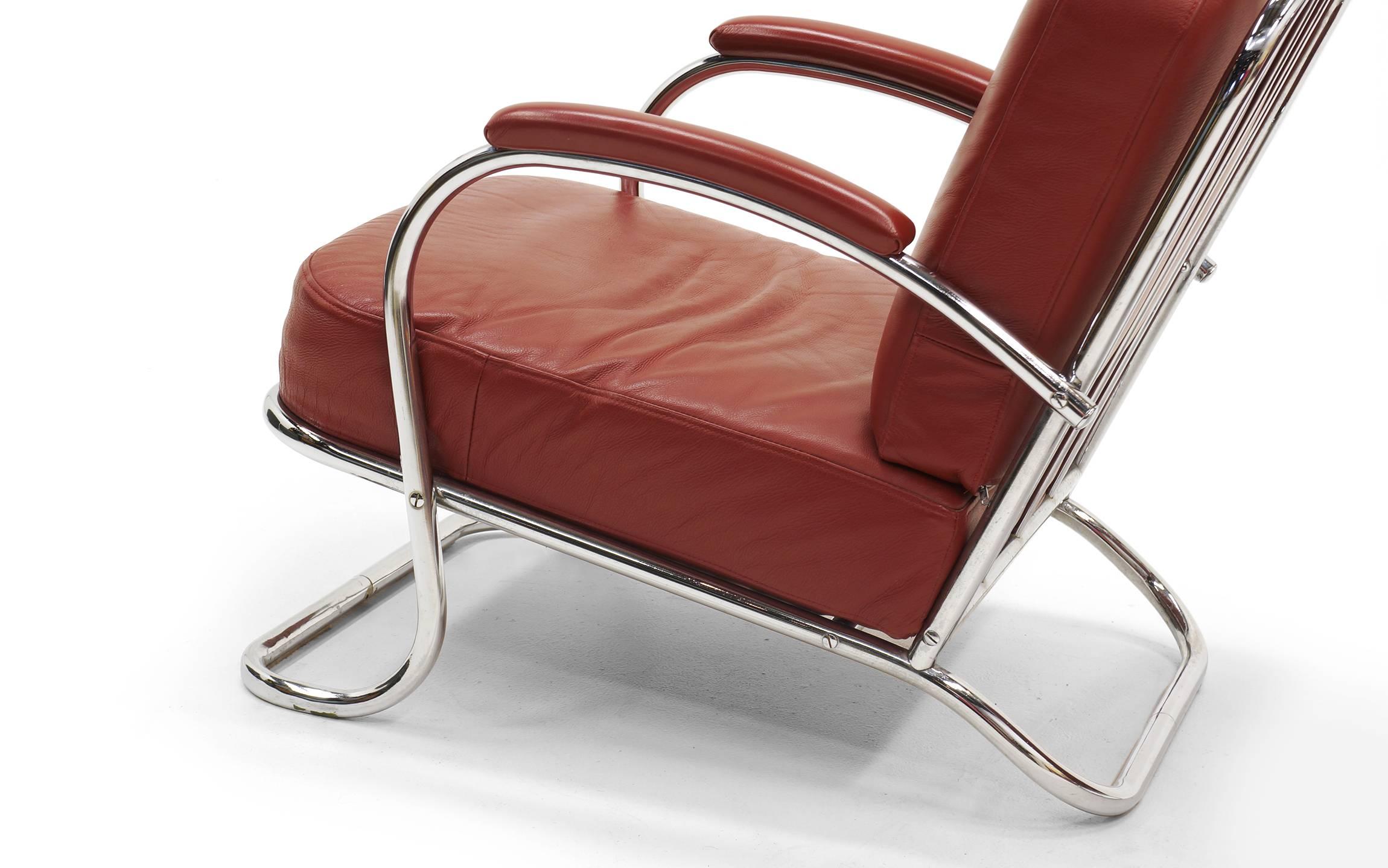 Polished Pair of Tubular Chrome and Red Leather Lounge Chairs by KEM Weber for Lloyd