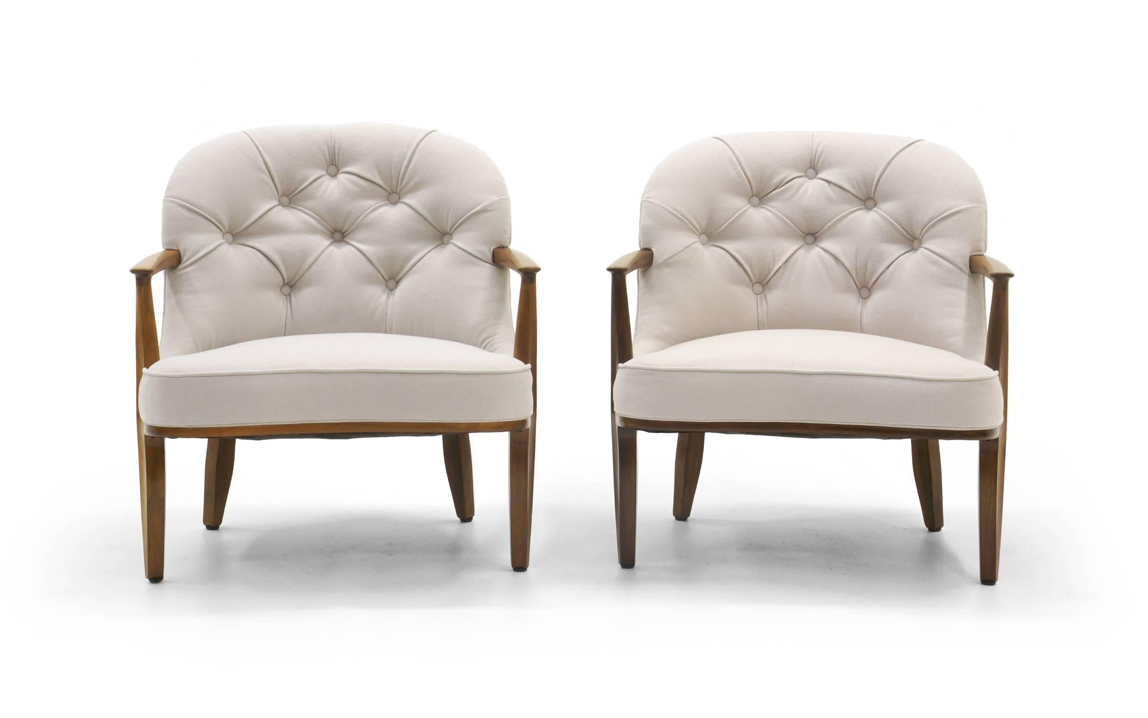 Pair of lounge chairs designed by Edward Wormley, Janus collection, for Dunbar. Reupholstered in a light greige (grey / beige) Maharam wool blend fabric. Very soft to the touch. The mahogany frames retain their original finish with beautiful patina.