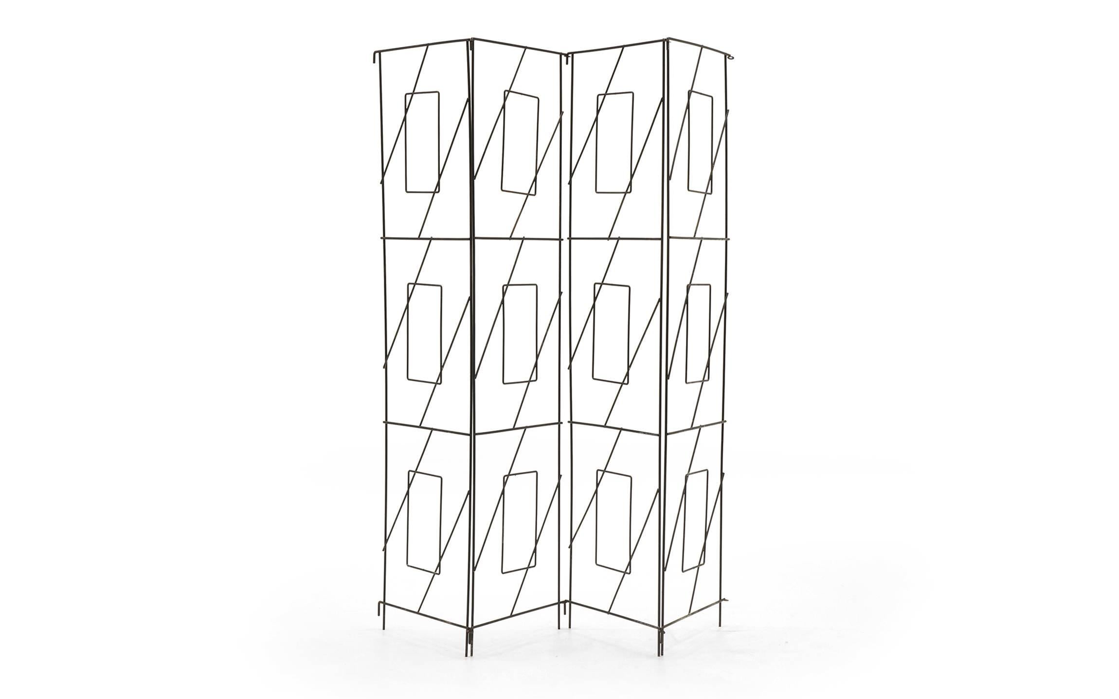 Rare Frederic Weinberg screen. Four panels. Original condition with nice patina. Width of each panel is 18 inches. Measurements below reflect the screen extended as far as possible while still standing, as pictured in the first photo.