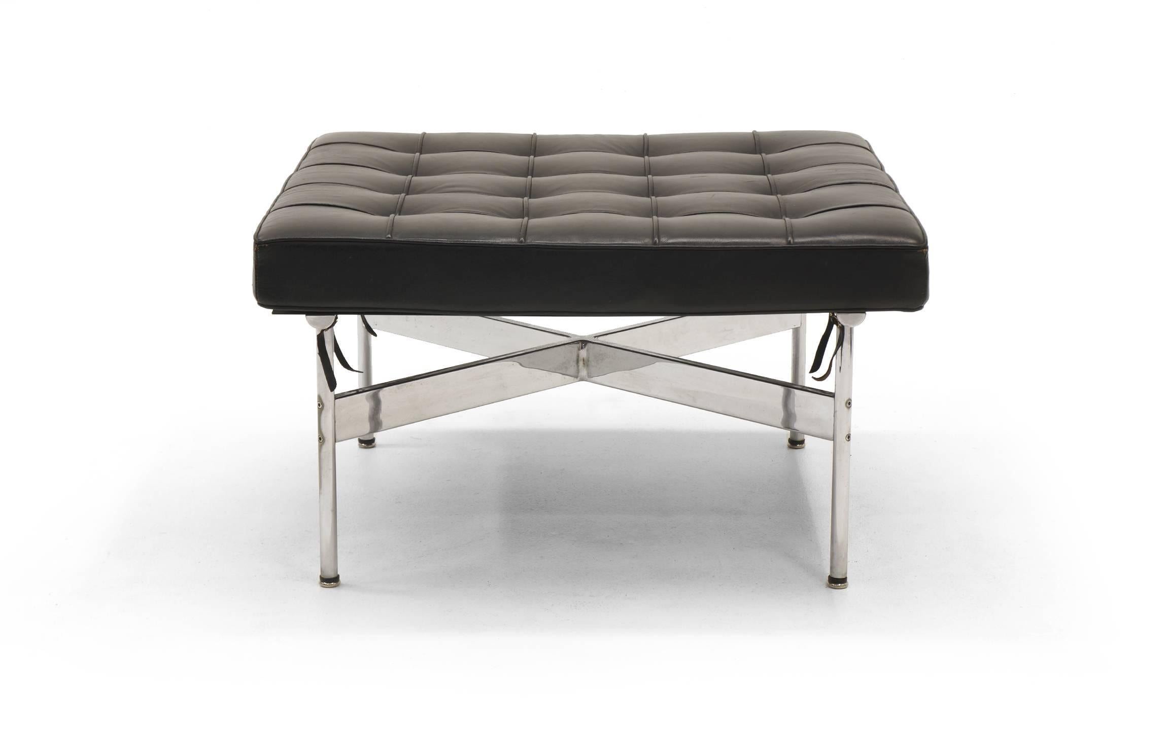 Original black leather ottoman / stool, model 21-LC, from the Architectural Group One line designed by William Katavolos, Ross Littell and Douglas Kelley for Laverne International. Chromed steel frame.