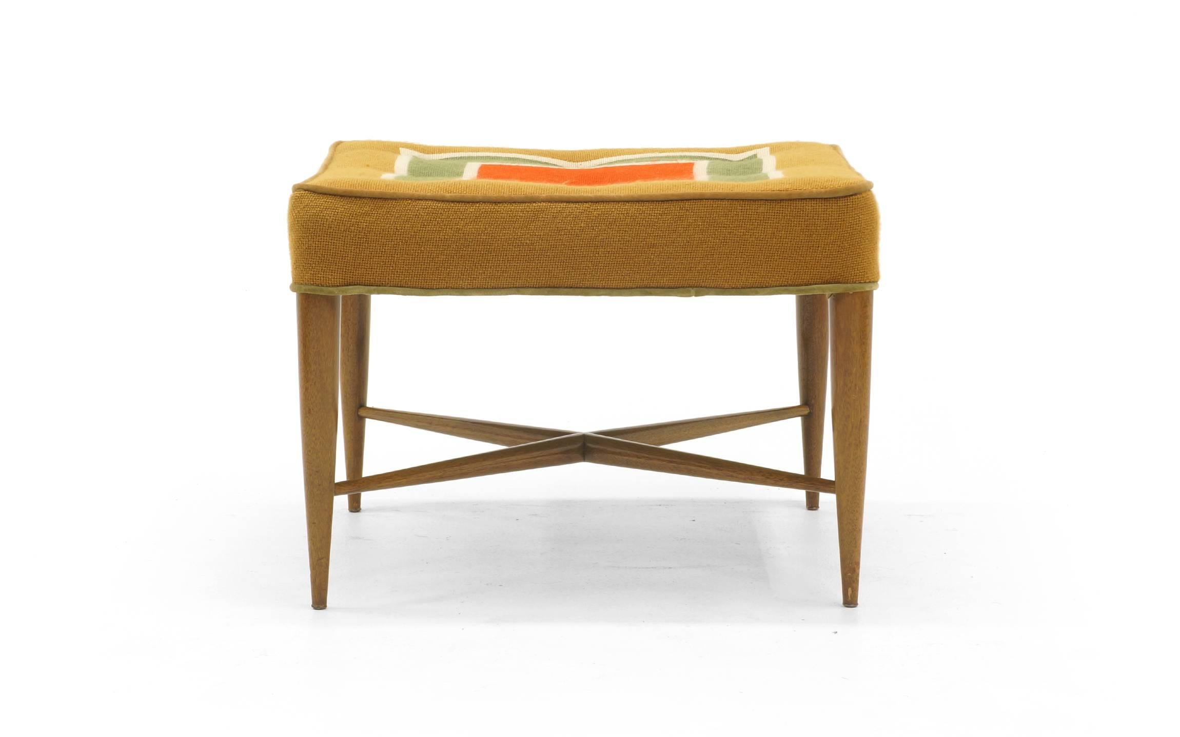 Edward Wormley stool. Mahogany frame with tapered X-cross stretchers. Probably reupholstered in the  mustard / green / orange concentric square patterned fabric in the 1970s.  