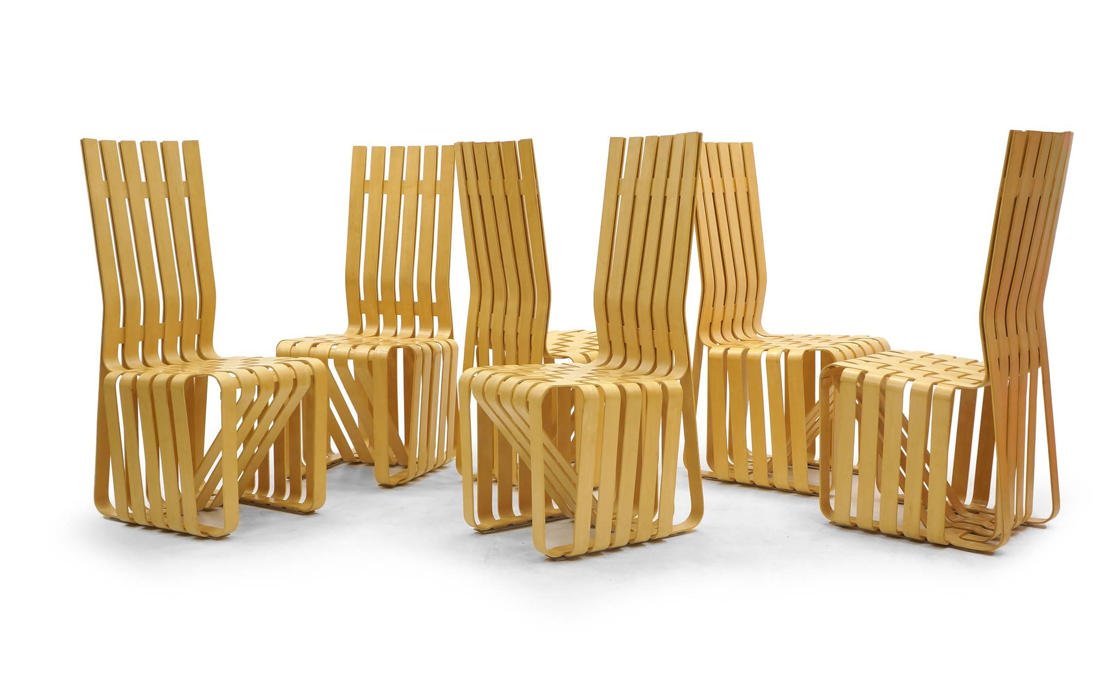 Set of six 'High Sticking' dining chairs by Frank Gehry, 1992, manufactured by Knoll. Inspired by the apple crates he had played on as a child, Pritzker Prize-winning architect Frank Gehry created the ribbon-like design of the High Sticking chair