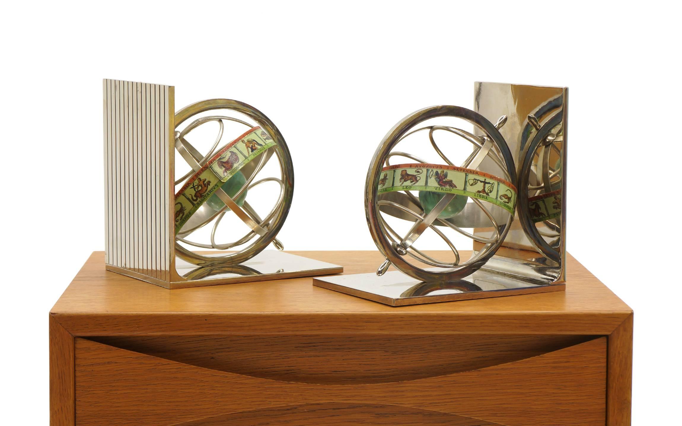 Pair of revolving world / signs of the Zodiac bookends in excellent condition. Made in Italy label.