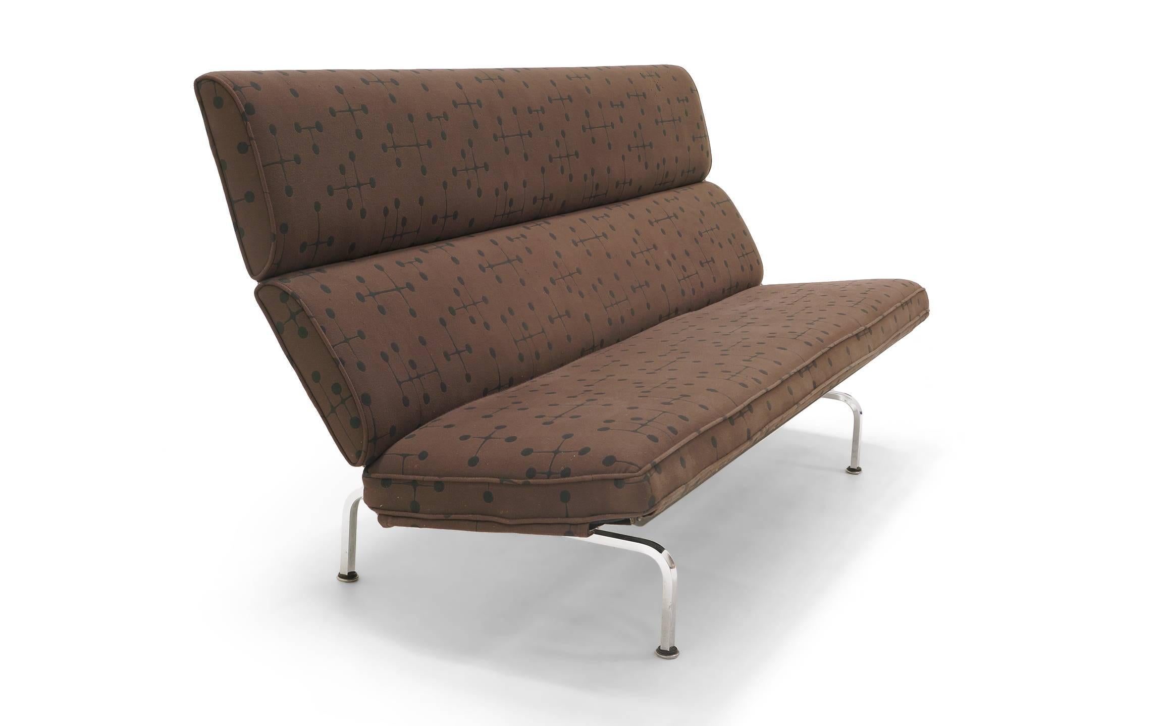 Early Charles and Ray Eames sofa compact for Herman Miller in Eames dot pattern fabric by Maharam. This vintage sofa was reupholstered several years ago. A nice example of this design in an iconic Eames fabric.