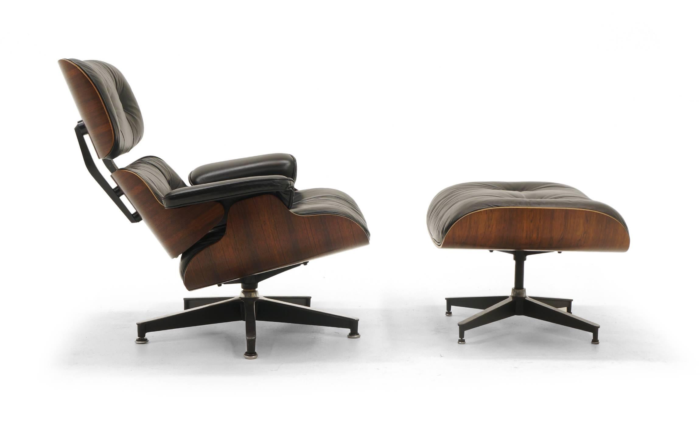 Authentic, original Eames lounge chair and ottoman in Brazilian rosewood and black leather manufactured by Herman Miller. Beautiful all original condition, 1970s production.