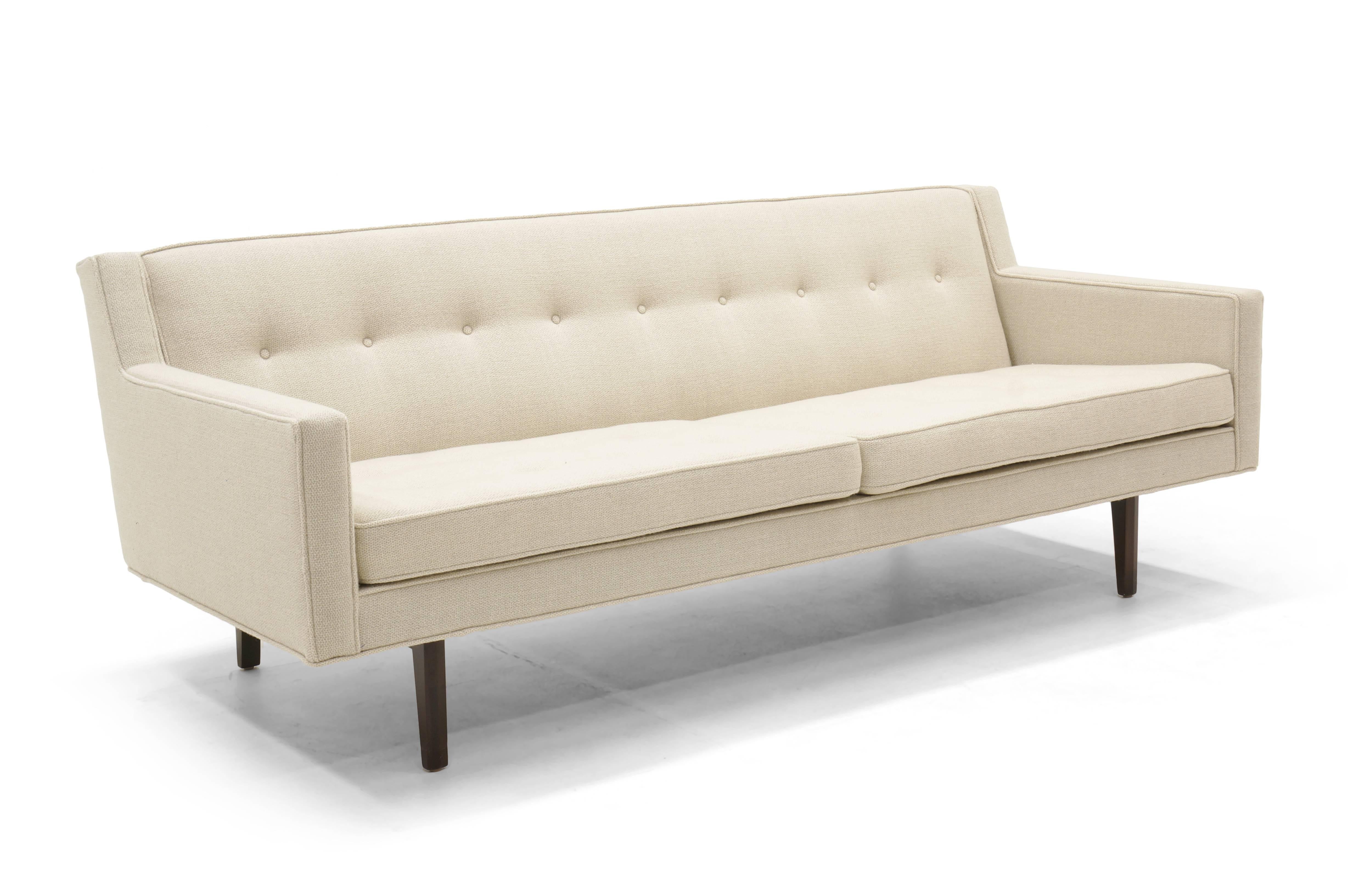 Very rare bracket sofa designed by Edward Wormley. This example features a back that is three inches higher than the standard bracket sofa design. This is the only example we've seen. The higher back makes the sofa more comfortable while retaining