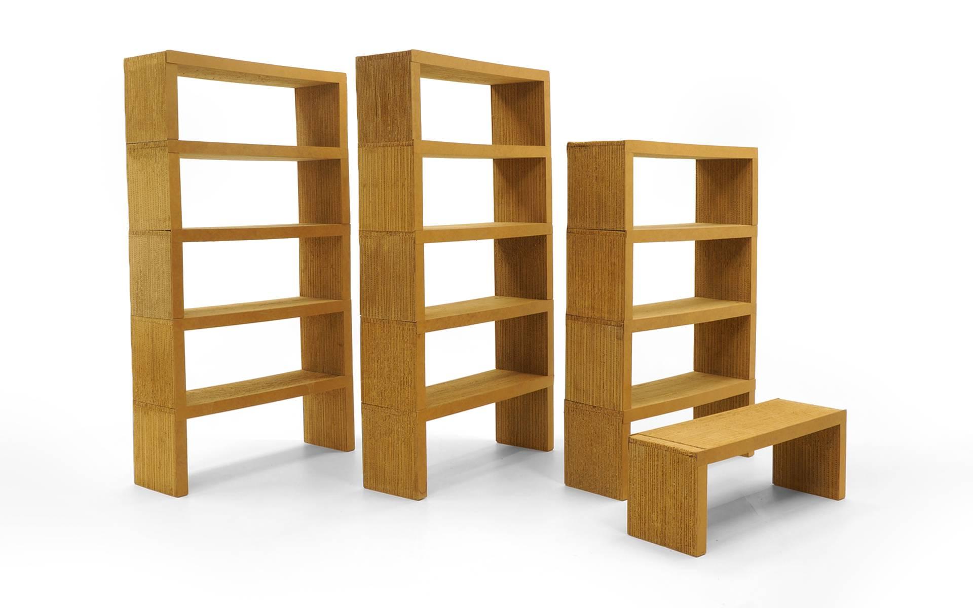 Large set of cardboard bookshelves designed by Frank Gehry for Easy Edges. These are all original, not the Vitra reissue. Overall very good to excellent condition. There are a few signs of wear and discoloration but no significant distractions. Look